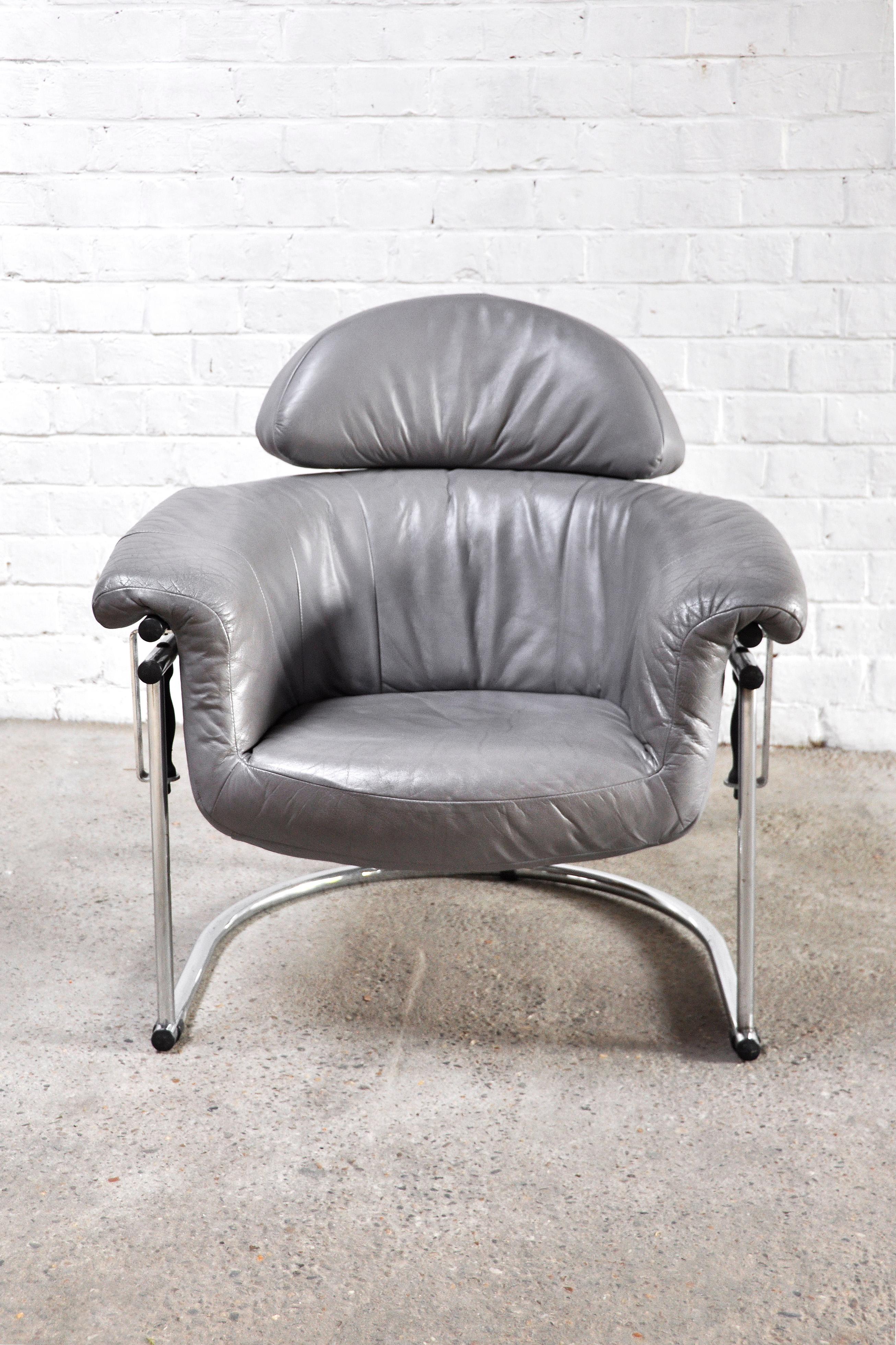 Rare and never before seen lounge chair out of the 1980’s. This chair is built with very heavy quality materials and has the ability to slightly swivel. The tubular chromed frame carries the leather seat in a unique design with hanging rubber bobbin