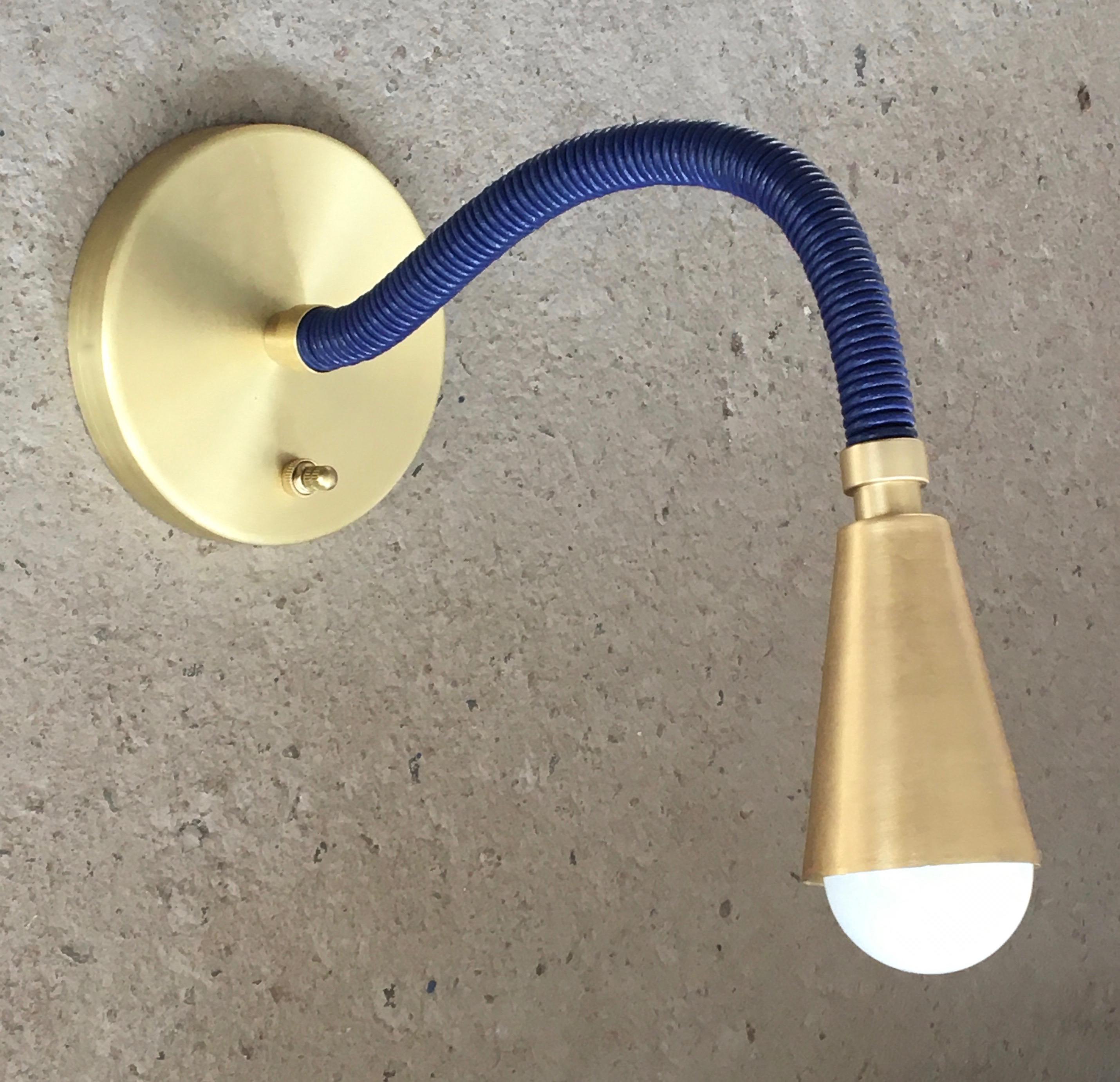 Avantgarden's custom made adjustable arm reading wall sconce. 
Choose from over 20 custom leather colors
Arm lengths come in 12