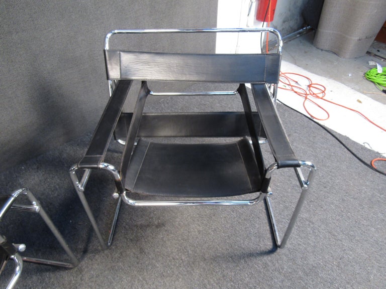 ( 1 ) Wassily style chrome frame armchair with iconic straps for the seats, backs and arms. 

Please confirm item location - NY or NJ - with dealer.