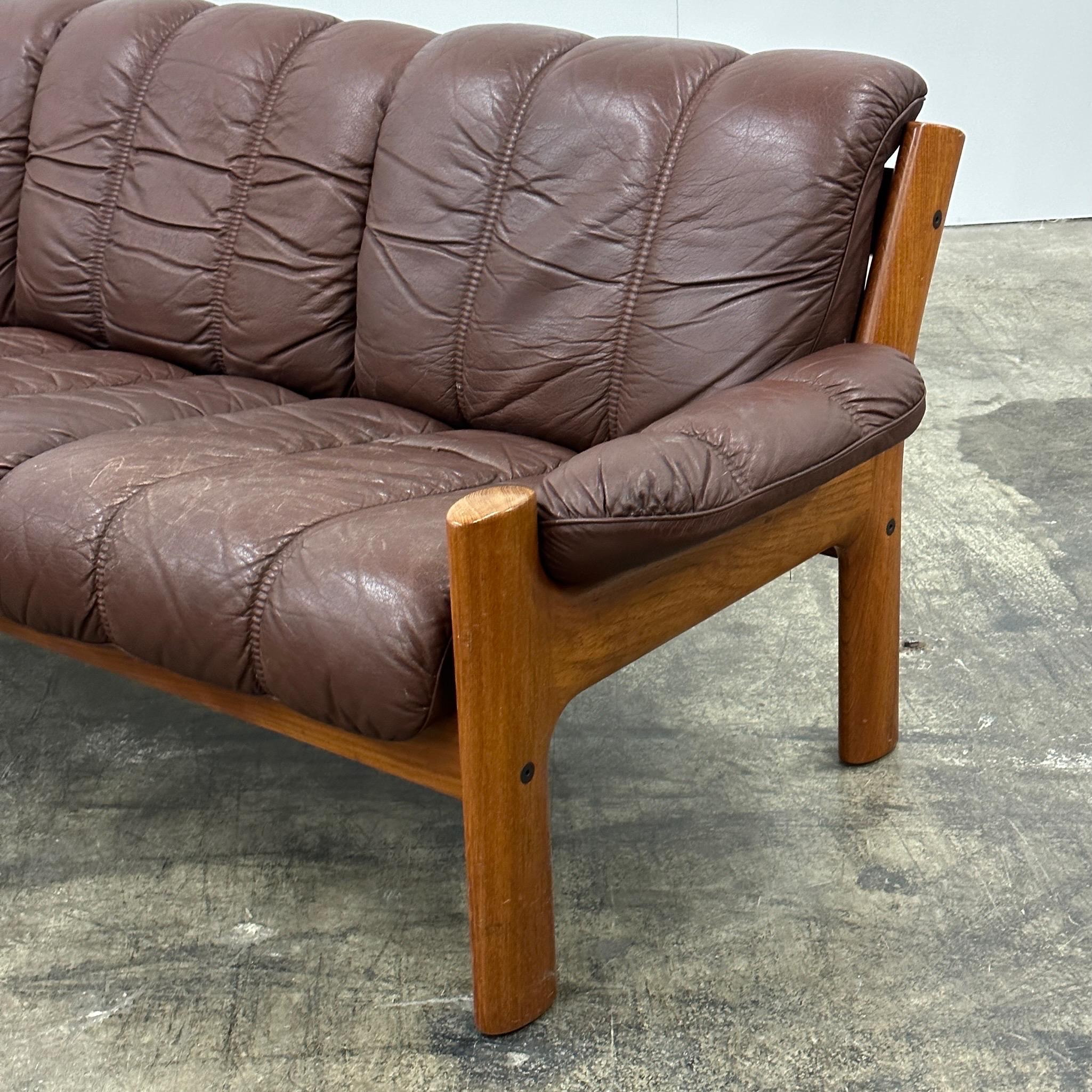 c. 1970s. Price is for the set. Danish leather with sculpted heavy wood frame. We have a matching pair of chairs available as well. Made in Norway. 