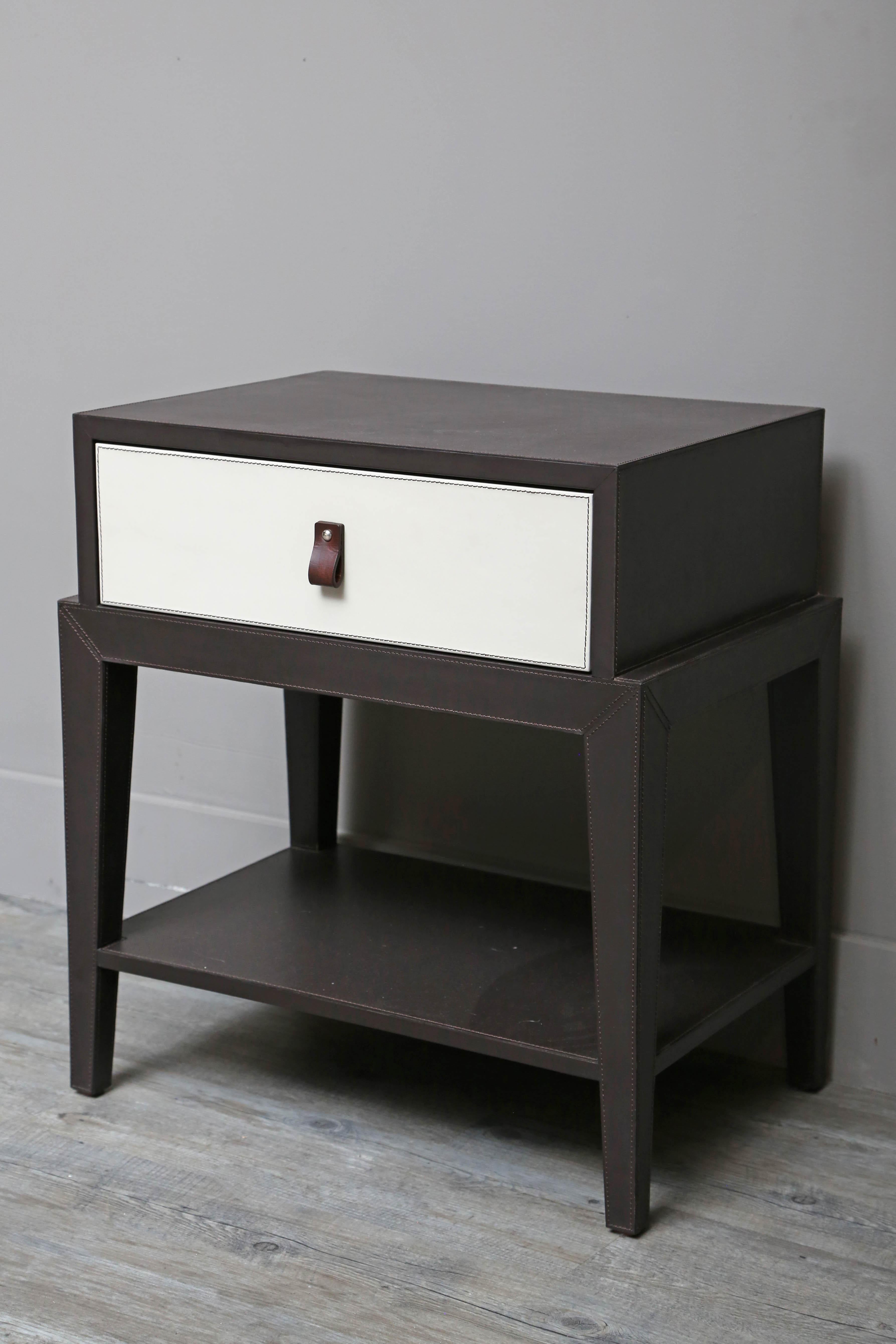Supple Italian leather nightstand designed by Serge de Troyer. Drawer is lined with suede.