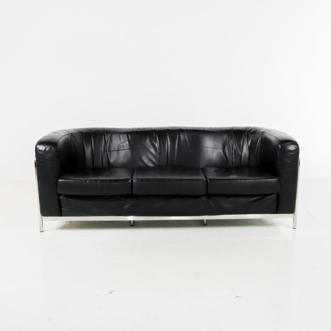 'Onda' three-seater sofa designed by De Pas, D'urbino & Lomazzi for Zanotta in 1985. The high-quality sofa has a playful character with a wavy frame made of chromed metal and upholstery in black leather. In good vintage condition with some light