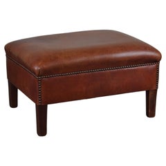 Vintage Leather ottoman in classic English style finished with decorative nails