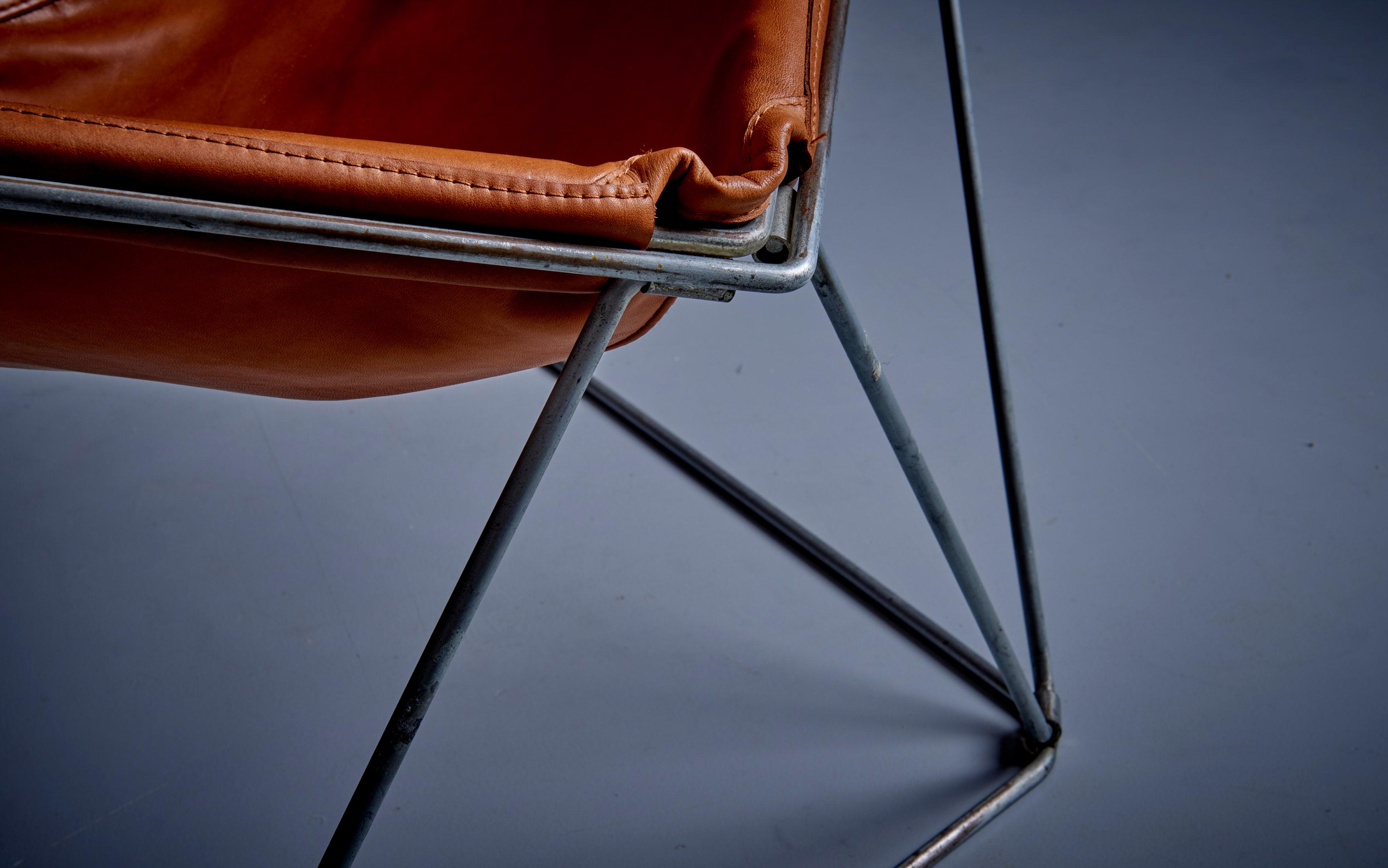 Penta chair by Jean-Paul Barry & Kim Moltzer in new aniline leather cover. Zinc Base is in fair condition.
 
