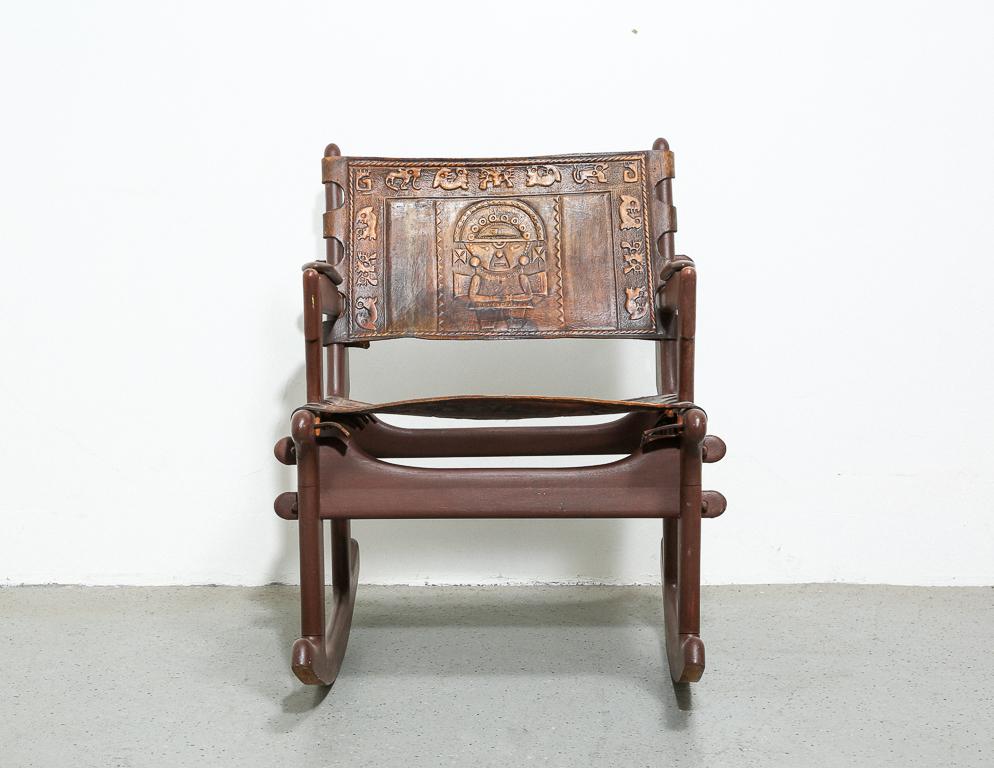 Vintage rocking chair in hardwood and embossed leather by Ecuadorian designer Angel Pazmino. Measure: 18