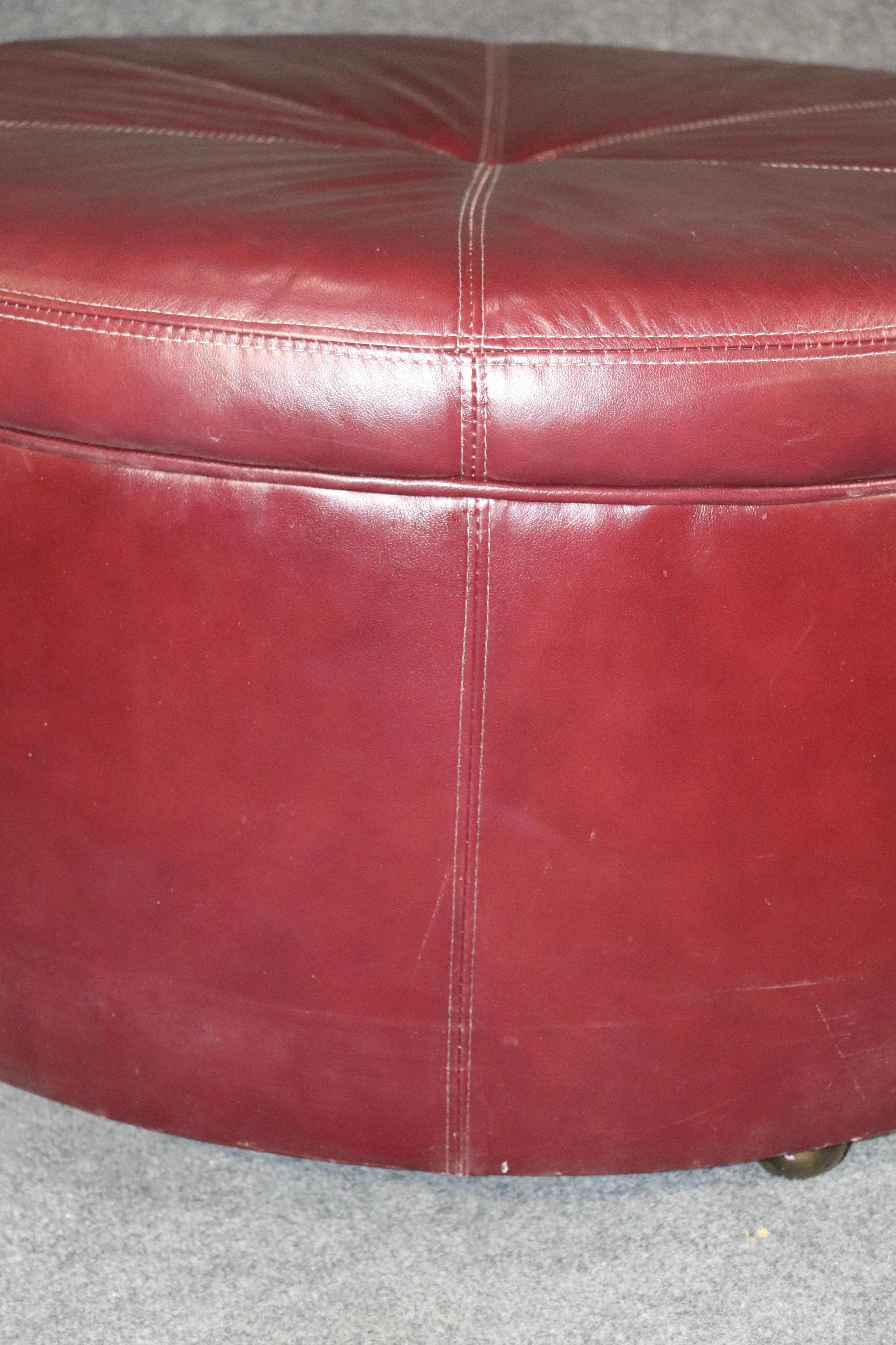Mid-Century Modern Leather Rolling Ottoman For Sale