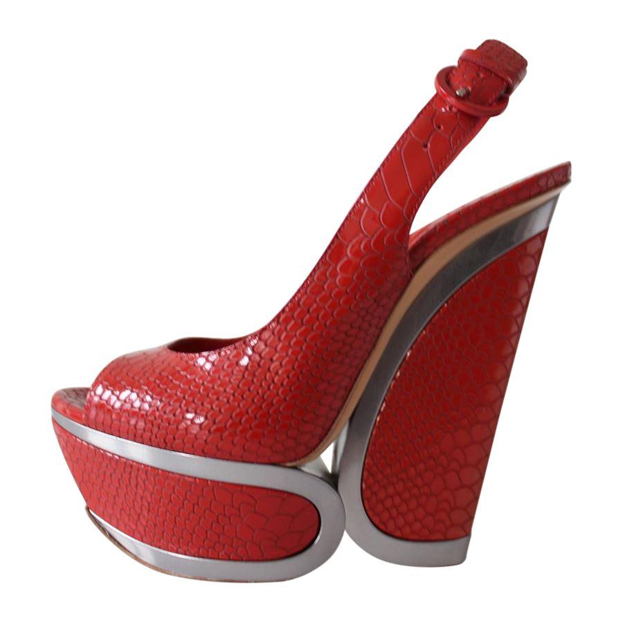 Pythondrill Python printed leather Red color Metal base Heel height cm 14 (5.5 inches) Plateau cm 4 (1.57 inches) Original price euro 700
