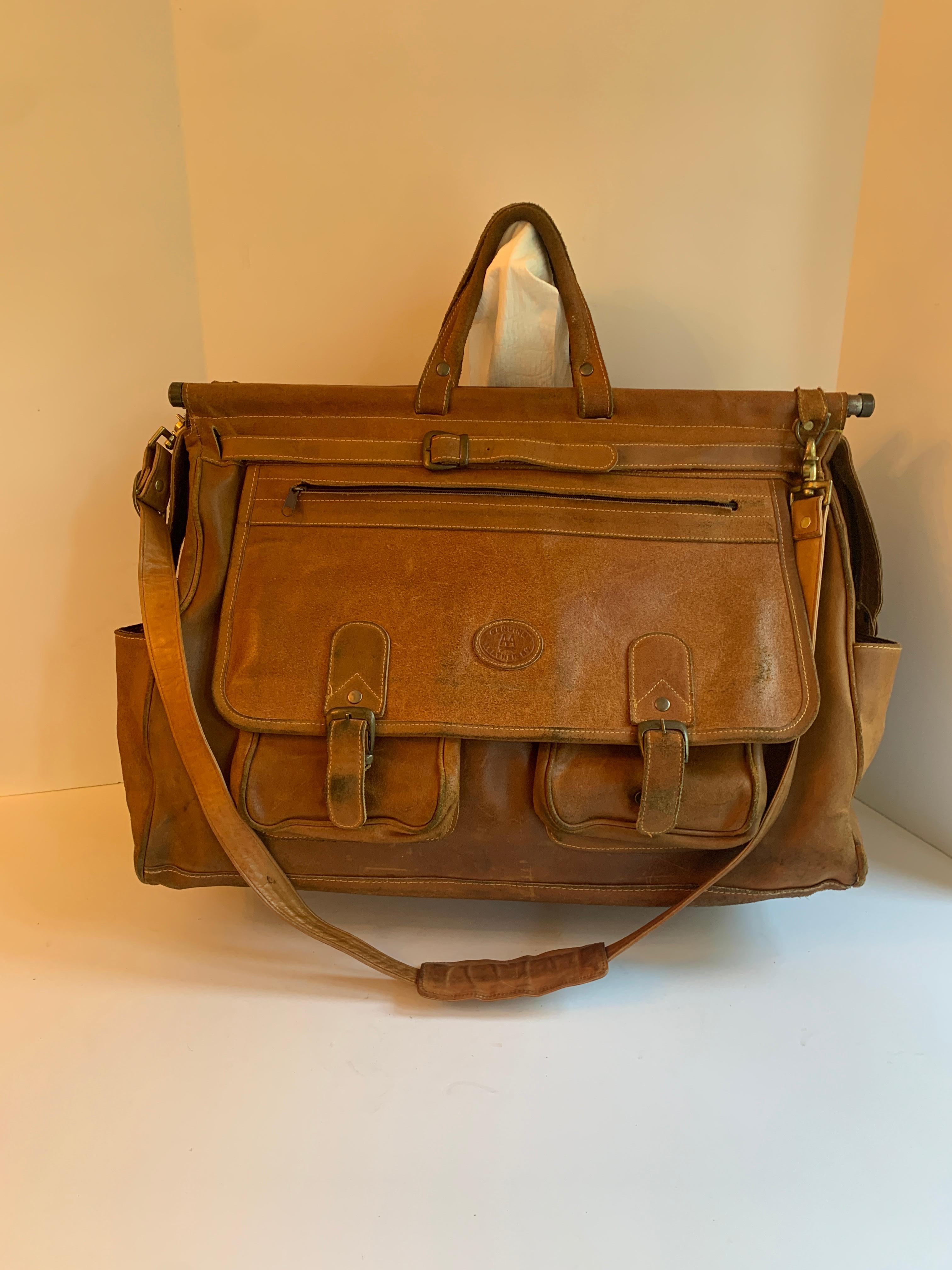20th Century Leather Shoulder Duffle Style Bag with Brass Supports For Sale