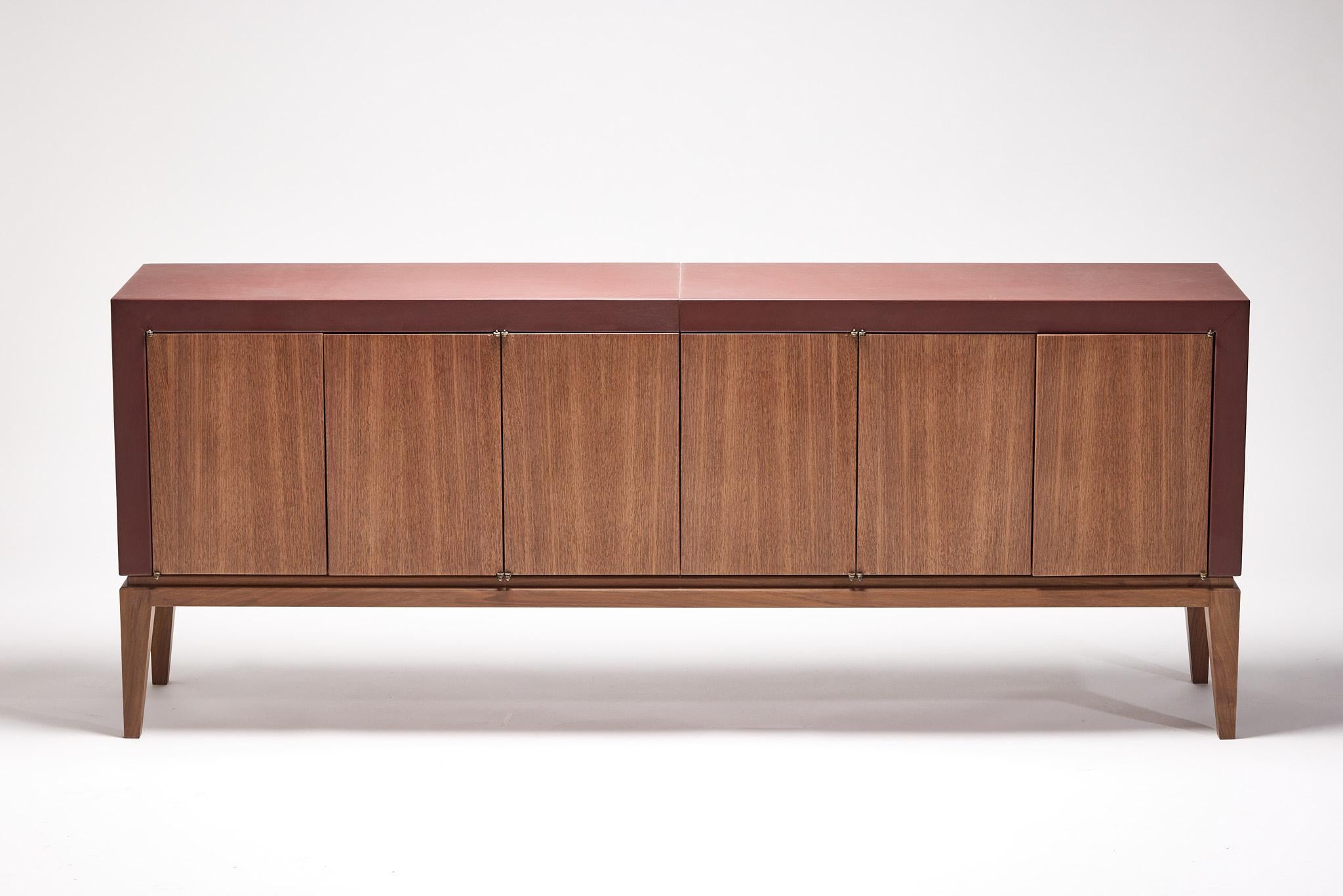 Sideboard in leather ( top and sides) and Walnut
One-off.