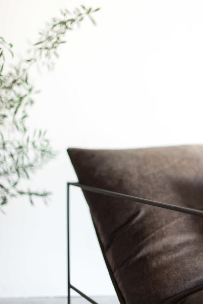 The Leather Sierra Chair is handmade locally in Los Angeles, California. flagship upholstered piece is regarded for not only its distinct design, but its exceptional comfort as well. An open, thin steel frame allows the design to incorporate