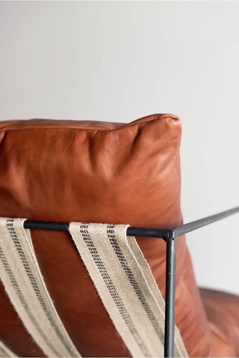 The Leather Sierra Chair in Havana is handmade locally in Los Angeles, California. flagship upholstered piece is regarded for not only its distinct design, but its exceptional comfort as well. An open, thin steel frame allows the design to