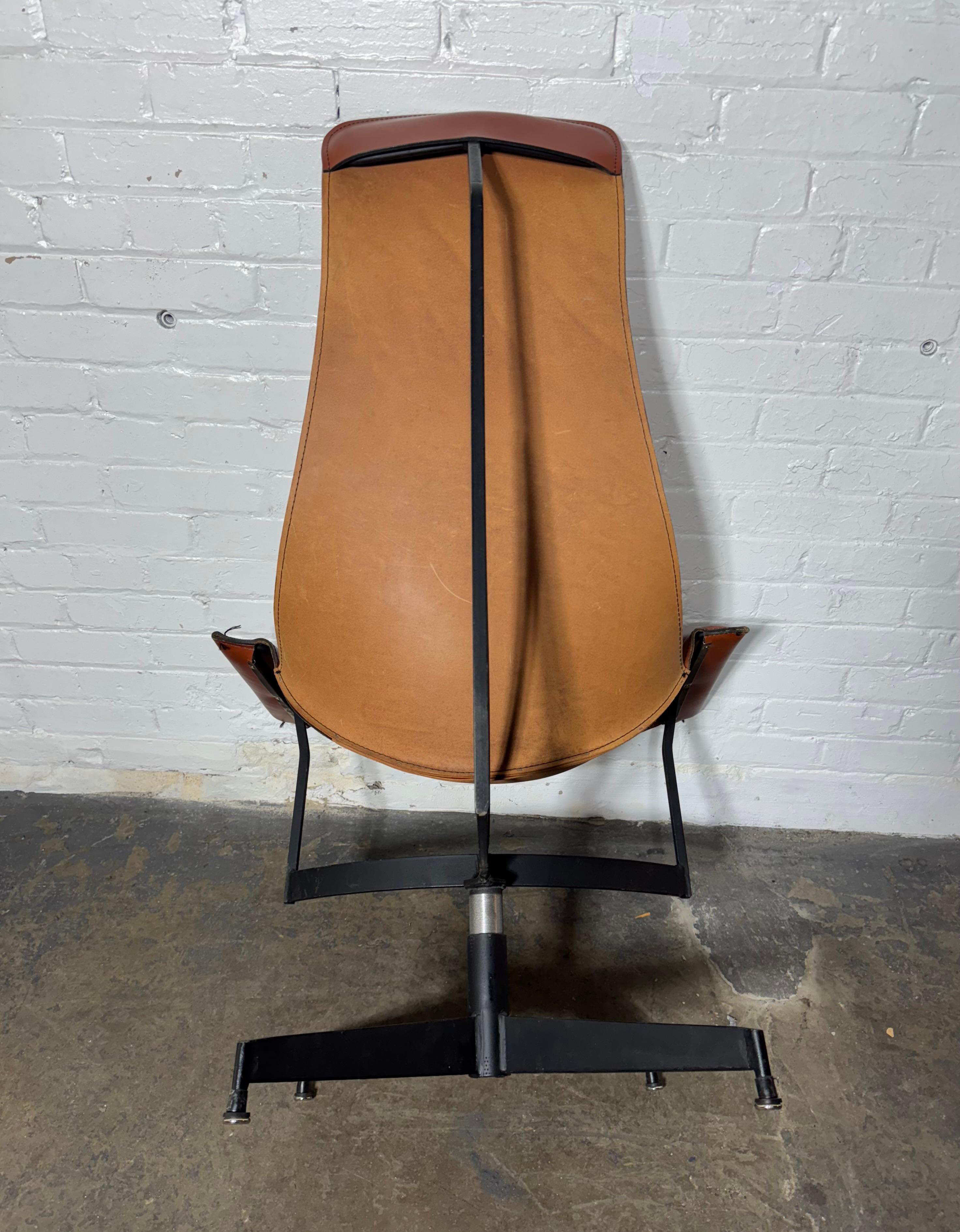 Classic Modernist 1960's Leather Sling K-CHAIR designed by William Katavolos.. Functional art / Sculpture. Super clean example. Extremely comfortable. 360% swivel 