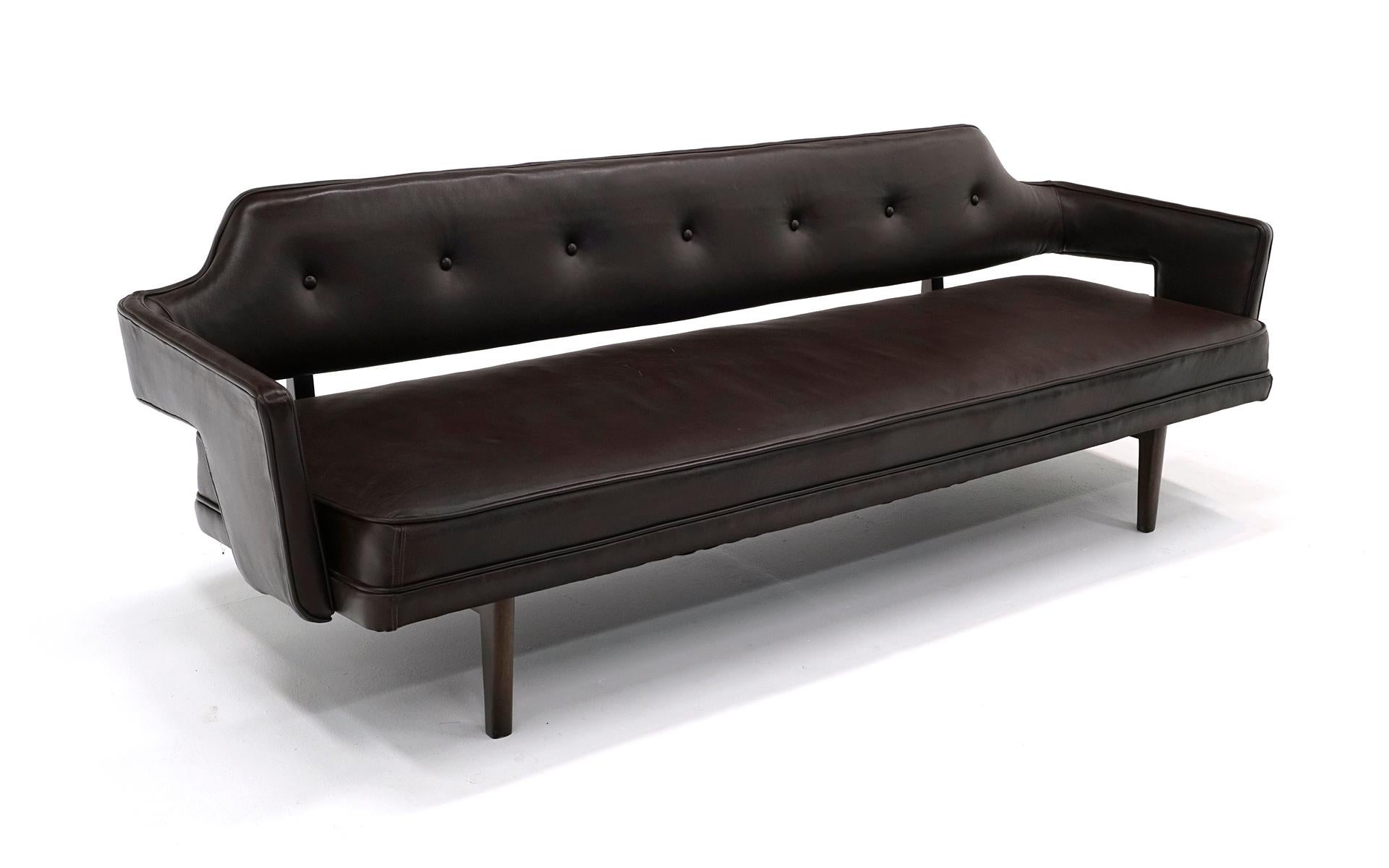 Dark brown leather sofa designed by Edward Wormley for Dunbar. This model is one of the most desirable of all of Wormley's designs. Very good condition with only a few edge scuffs to the leather. Mahogany frame.