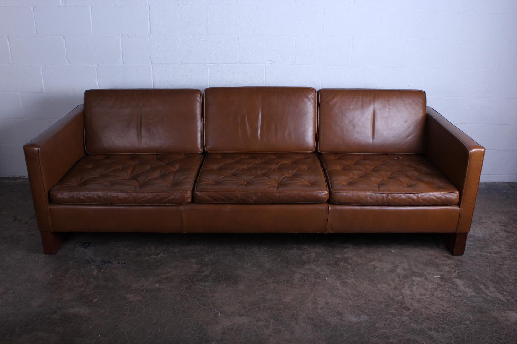 Rare sofa designed by Mies van der Rohe in 1930 and sold through Knoll for a short time in 1960. This sofa retained it's original leather with wonderful patina.