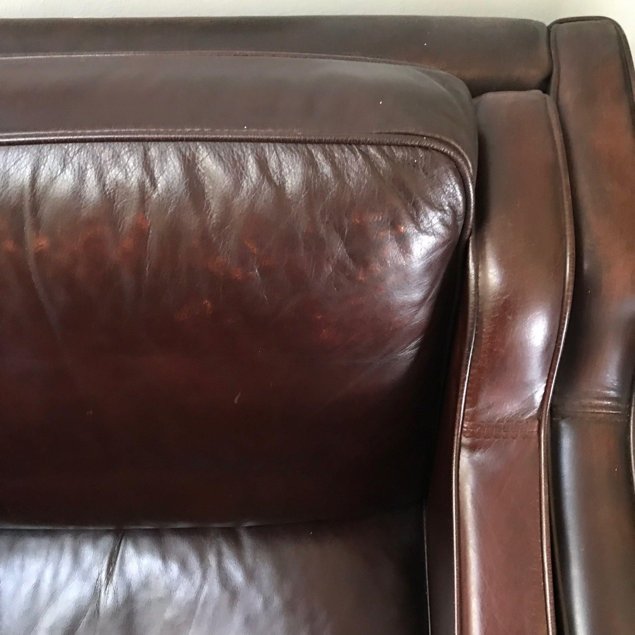 A dark brown leather Børge Mogensen sofa.