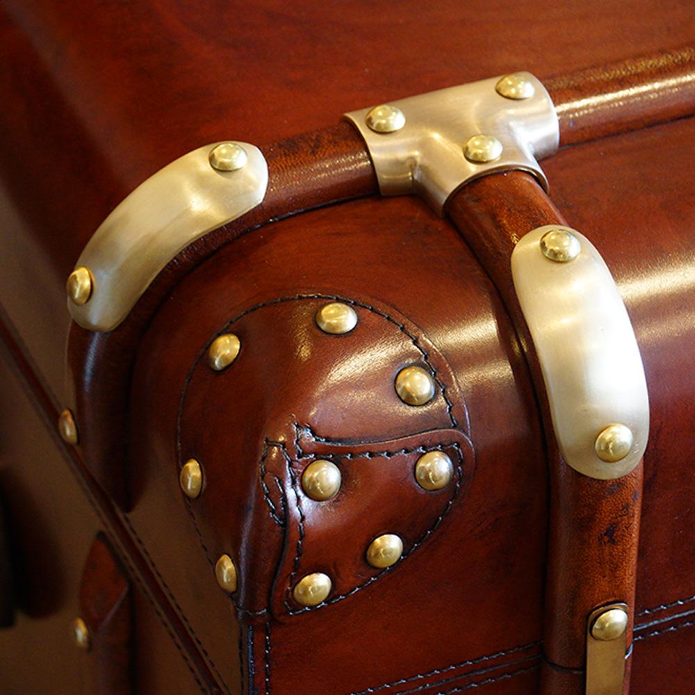 Leather 'Steamer trunk' bedside chest
This leather bedside chest has been custom made for us.
It is made using the style of a steamer trunk that were taken on world cruises.
These are beautifully made using fine leather and traditional