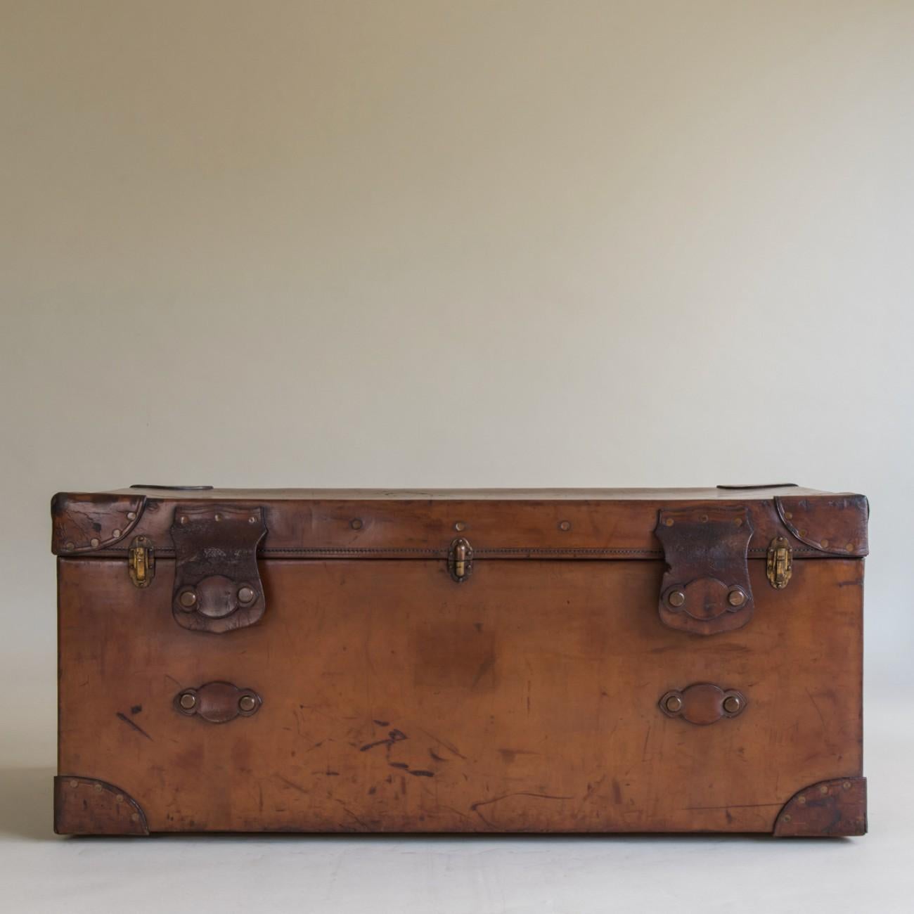 An exceptional leather trunk with original interior made by Finnigans, one of England's finest luggage making companies, circa 1920.

Dimensions: 48cm/19 inches (height) x 115cm/45 inches (width) x 56cm/22 inches (depth).

Bentleys are Members of