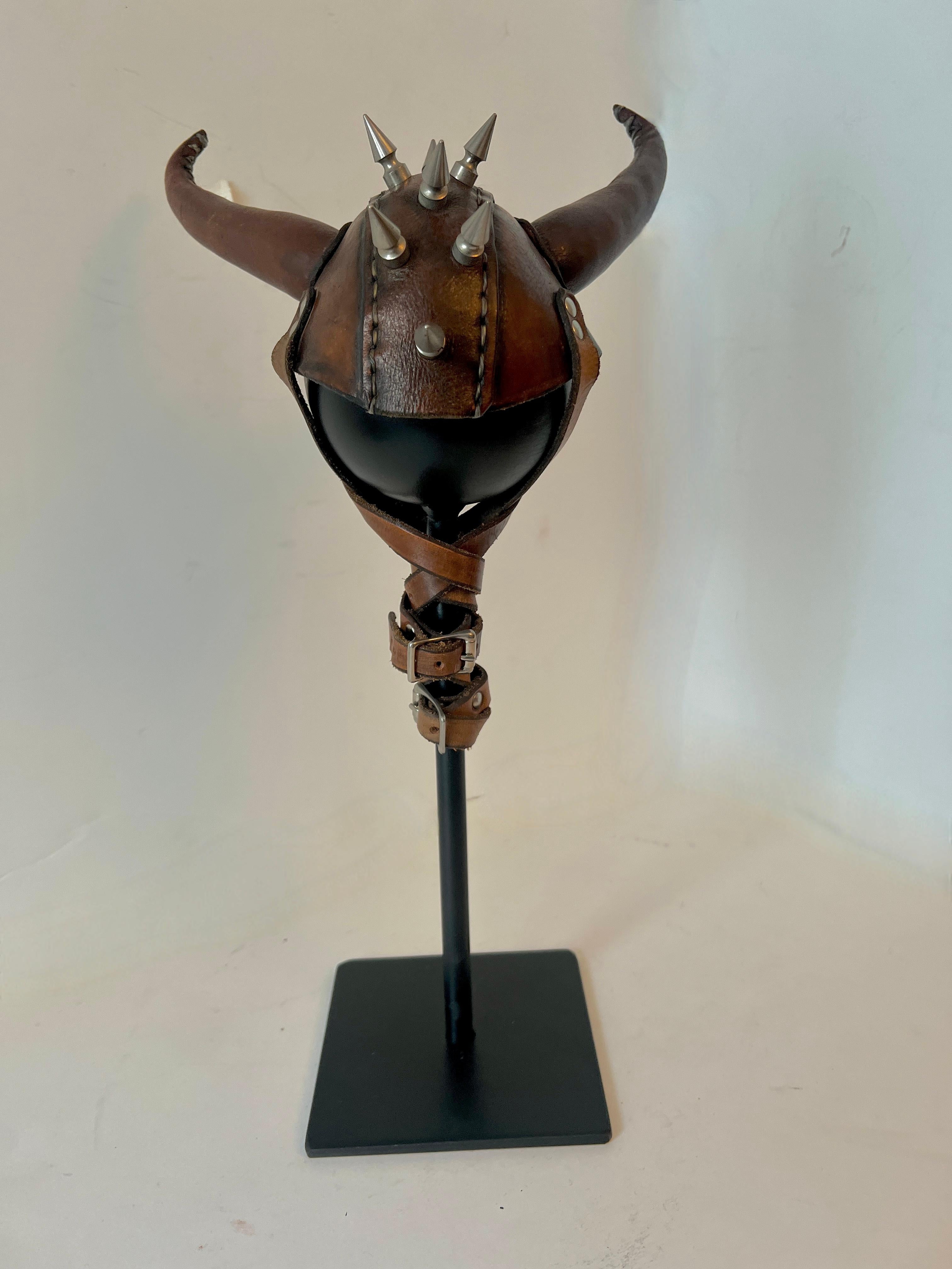 Hand-Crafted Leather Studded Helmet Mounted on Custom Iron Stand For Sale