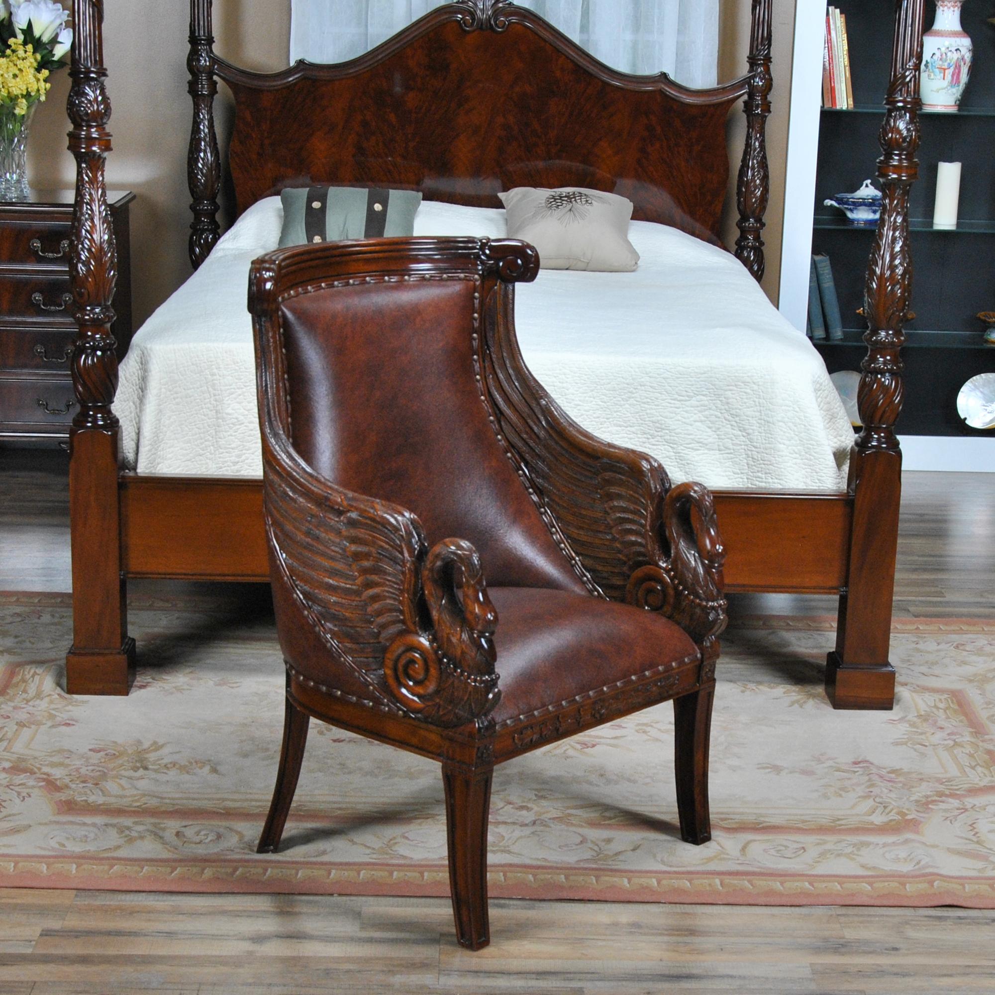 This high end Leather Swan Arm Chair from Niagara Furniture is impressive with solid mahogany hand carved details as well as the full grain genuine leather upholstery. A great designer look with a solid and comfortable frame. Inspired by an antique