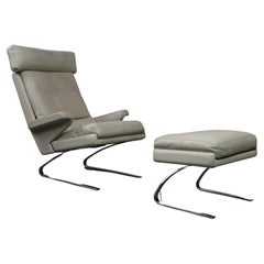 Fauteuil de salon pivotant en cuir avec pouf pour COR, Allemagne, années 1960