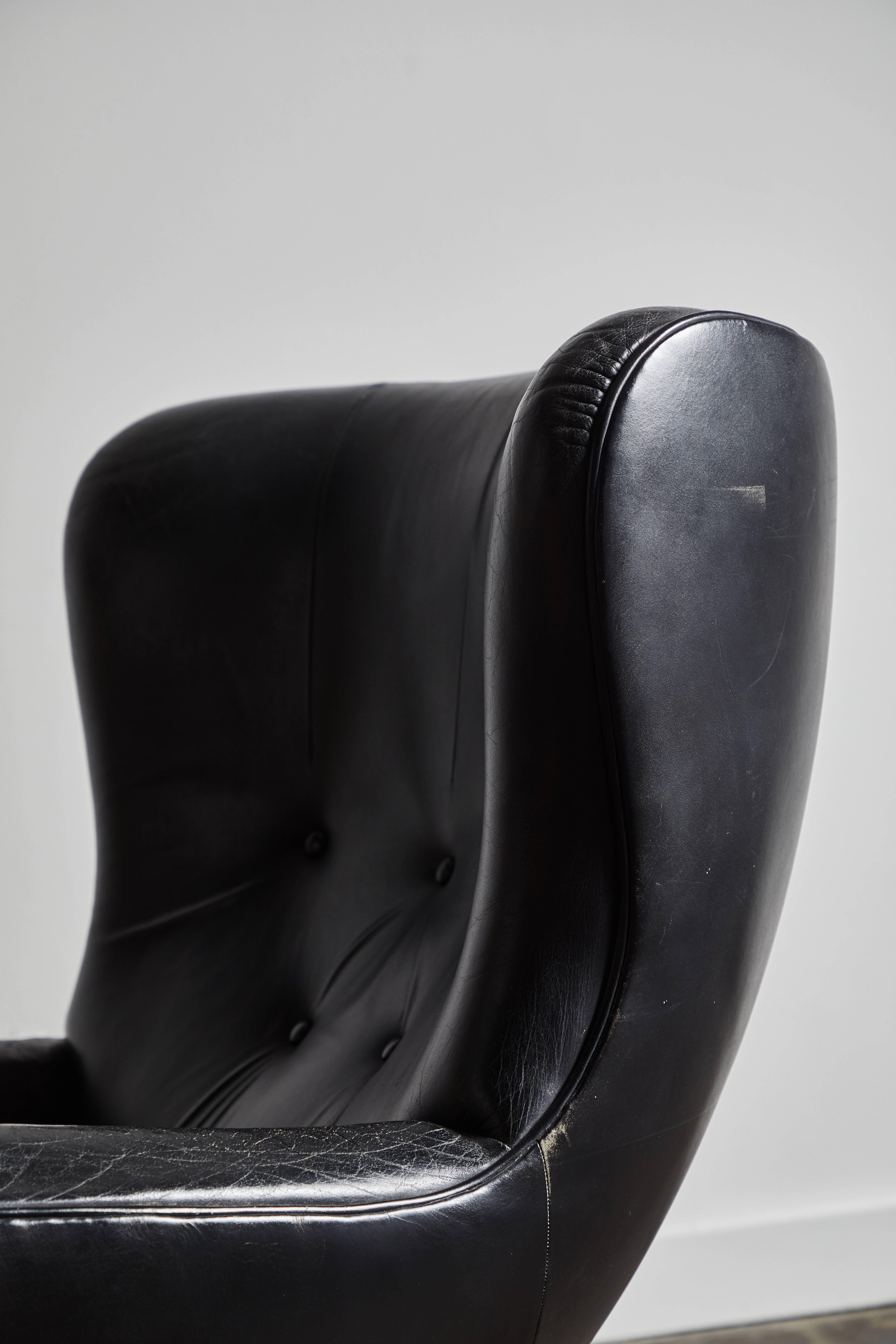 Leather Swivel Lounge Chair and Ottoman by Illum Wikkelsø 4