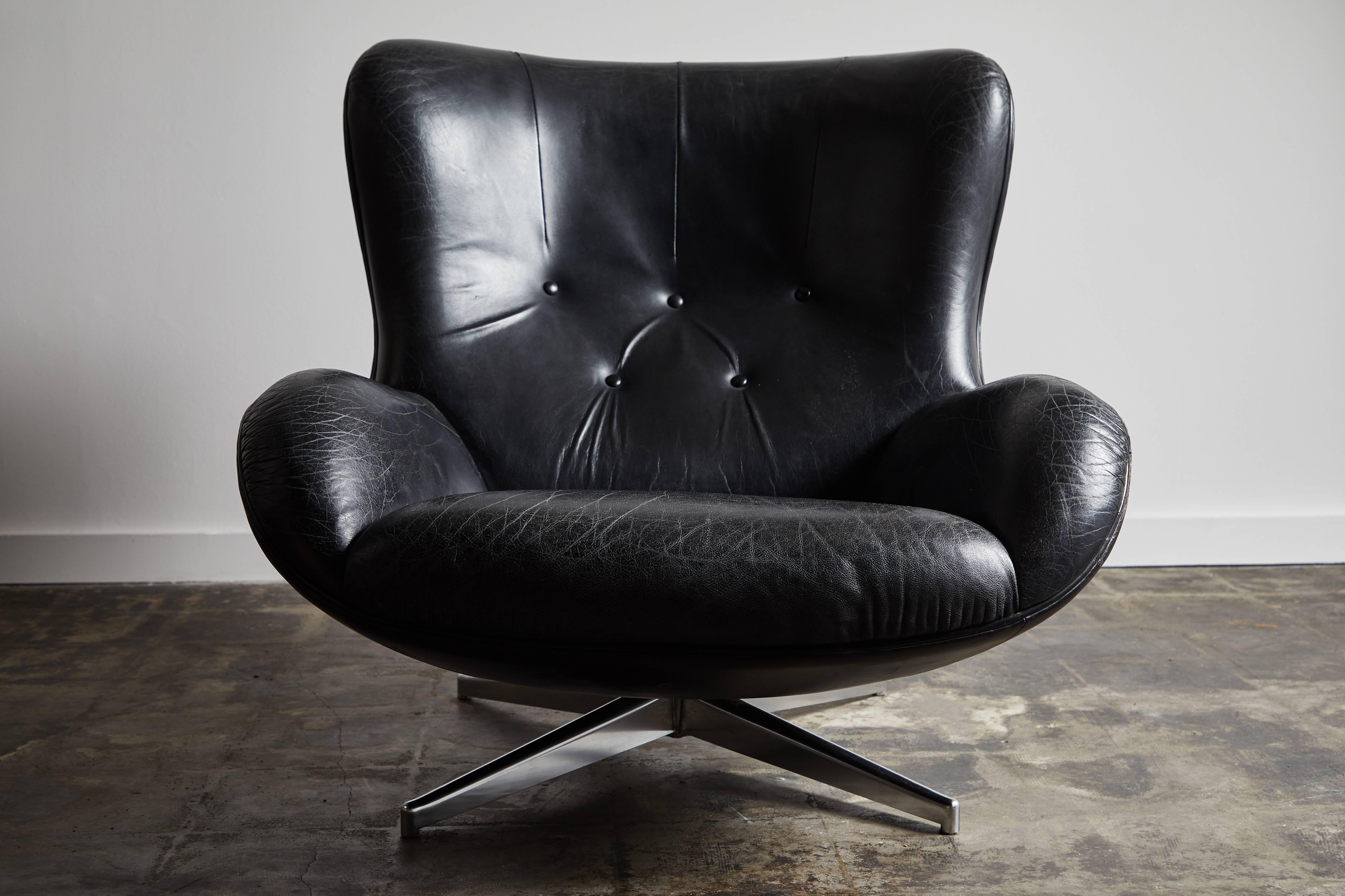 Danish Leather Swivel Lounge Chair and Ottoman by Illum Wikkelsø