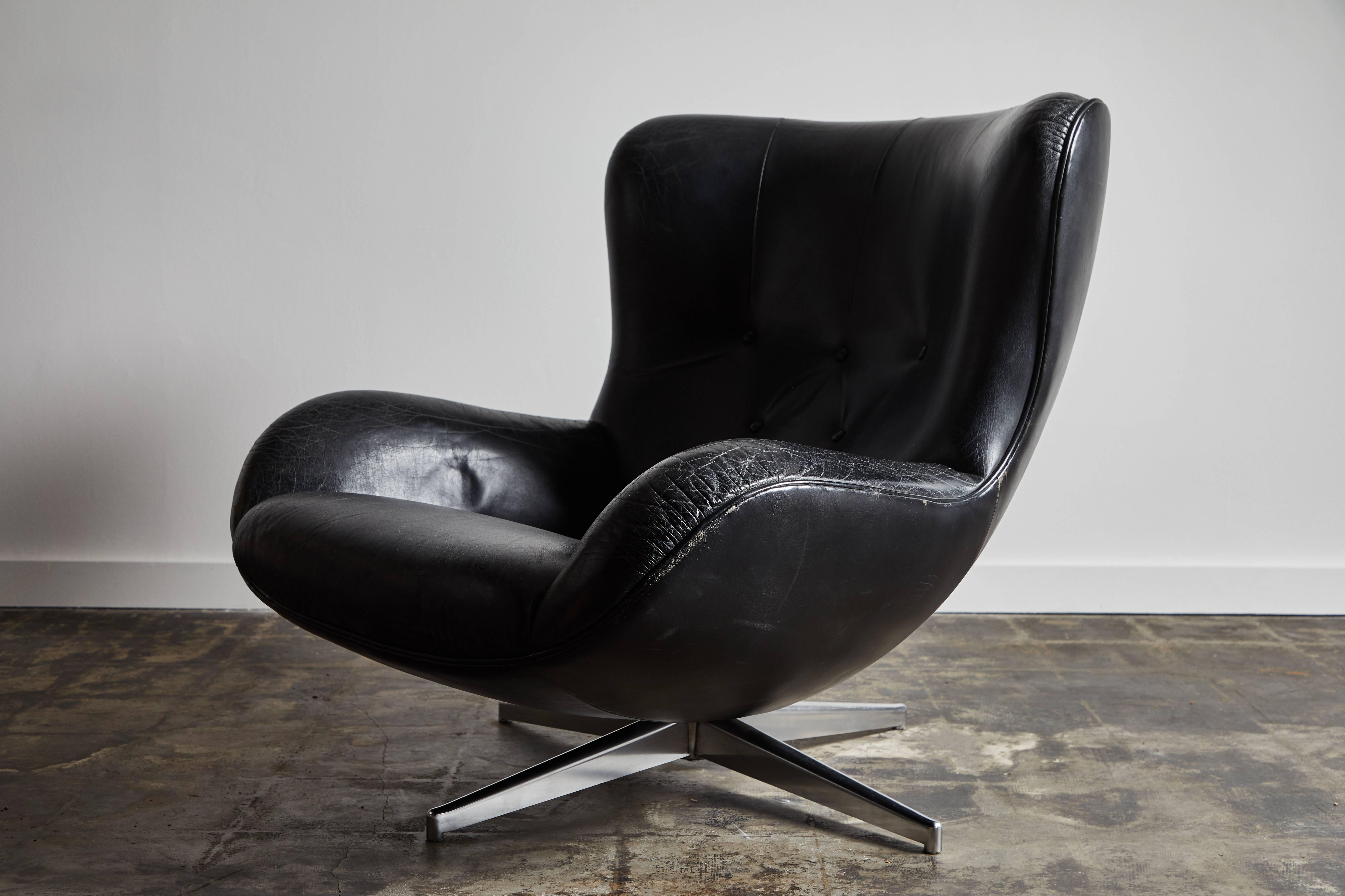 Leather Swivel Lounge Chair and Ottoman by Illum Wikkelsø In Good Condition In Los Angeles, CA