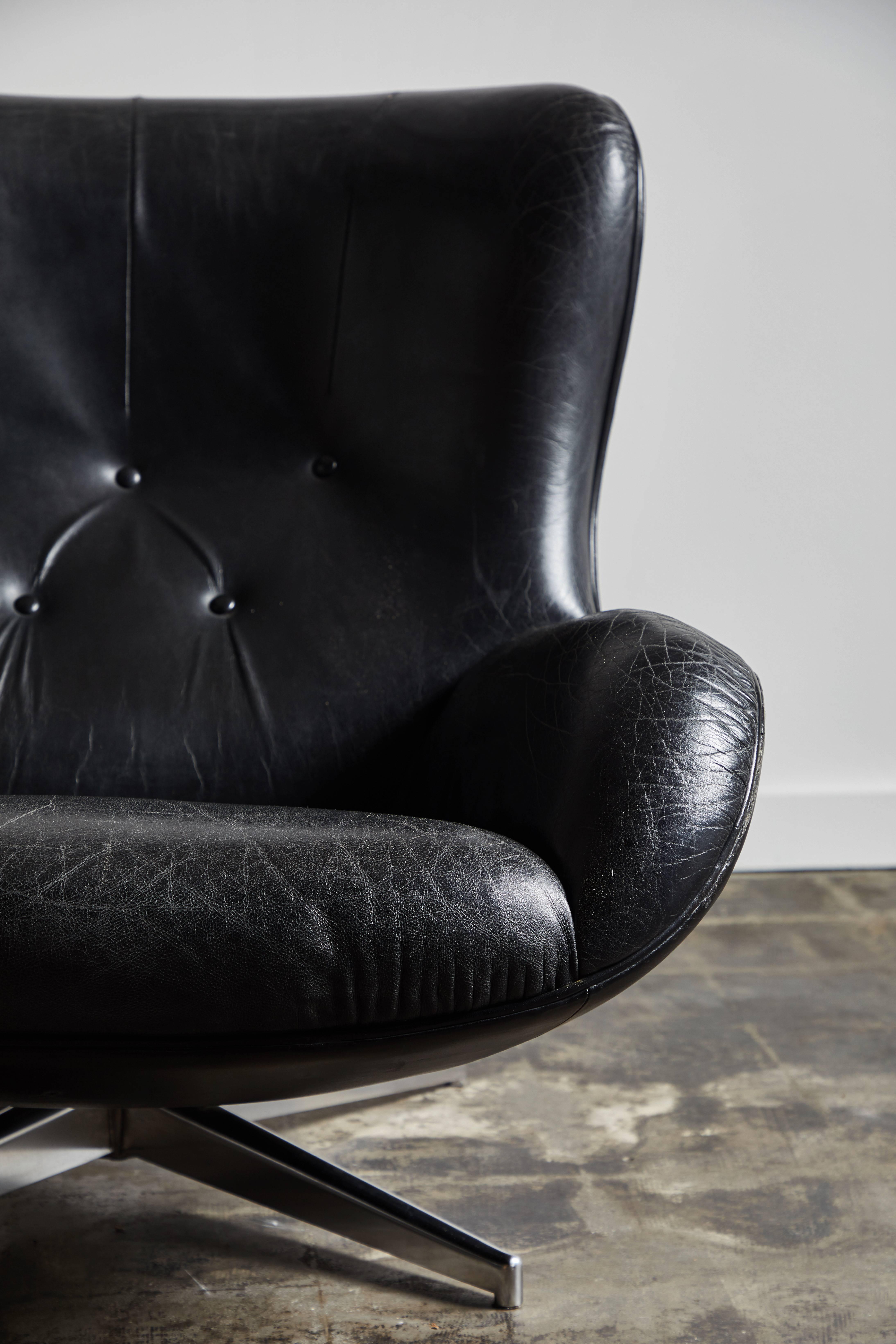 Leather Swivel Lounge Chair and Ottoman by Illum Wikkelsø 2