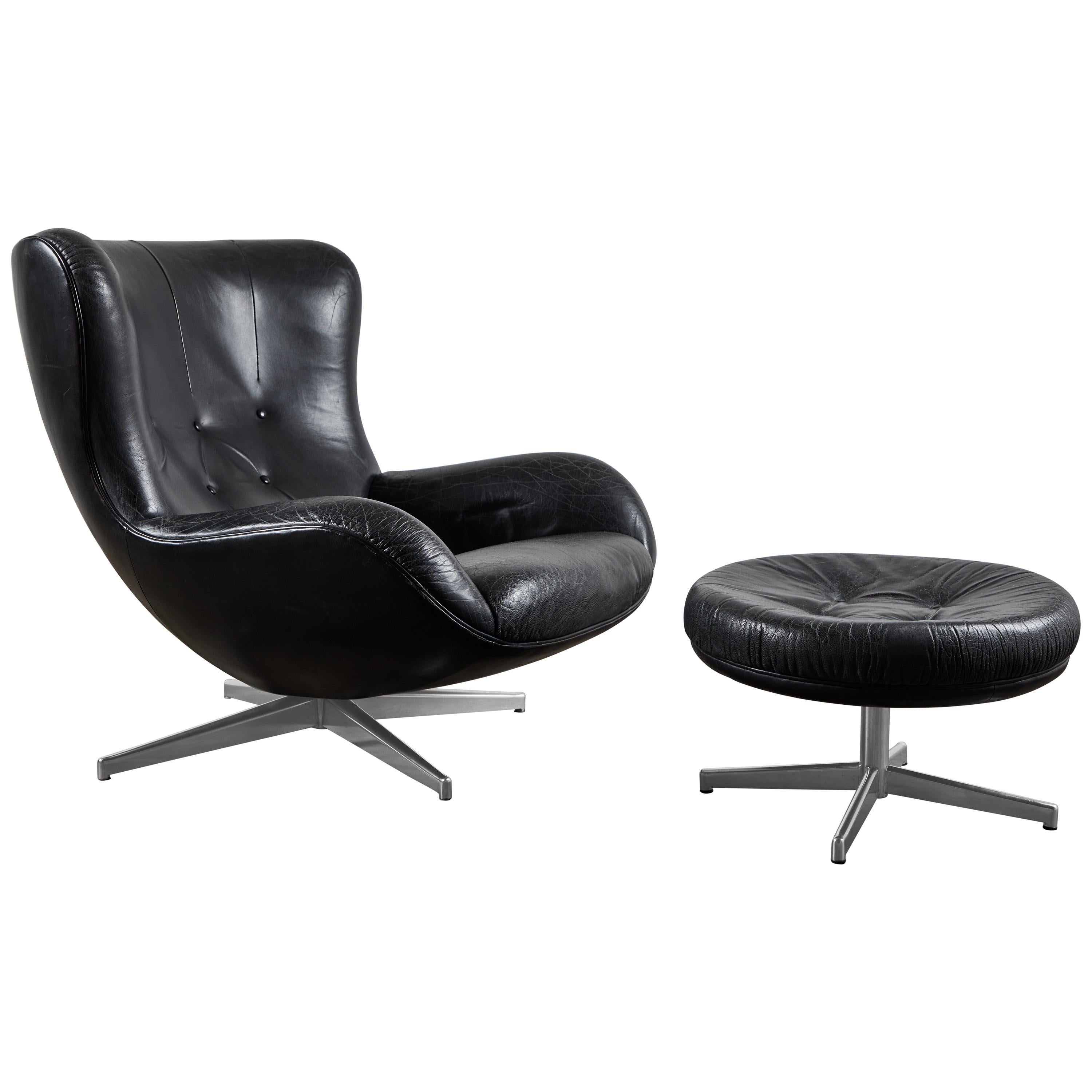 Leather Swivel Lounge Chair and Ottoman by Illum Wikkelsø