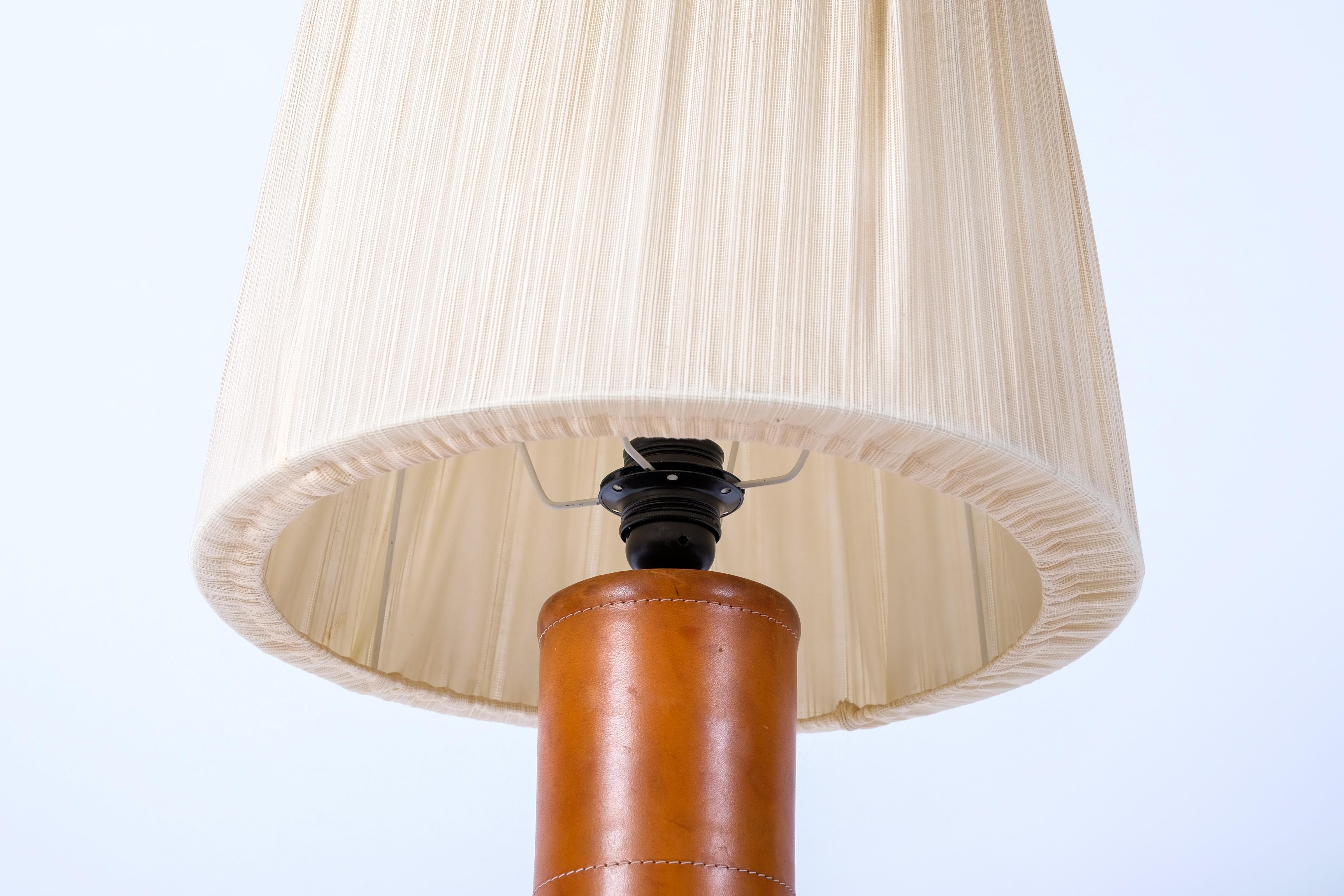 Mid-20th Century Leather table lamp by Bergboms, Sweden, 1960s For Sale