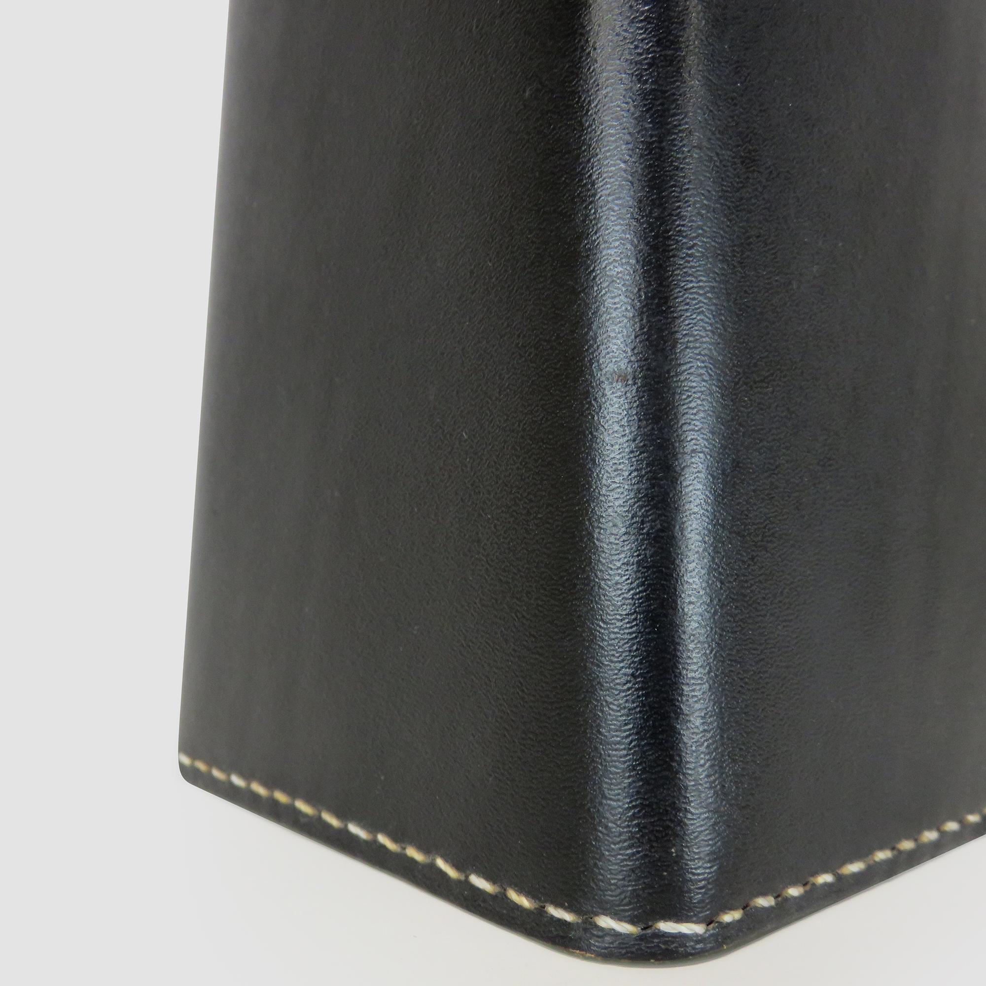 Black leather table lamp designed by Lisa Johansson-Pape for Illums Bolighus. 

Rewired. Shade not included.																																																		