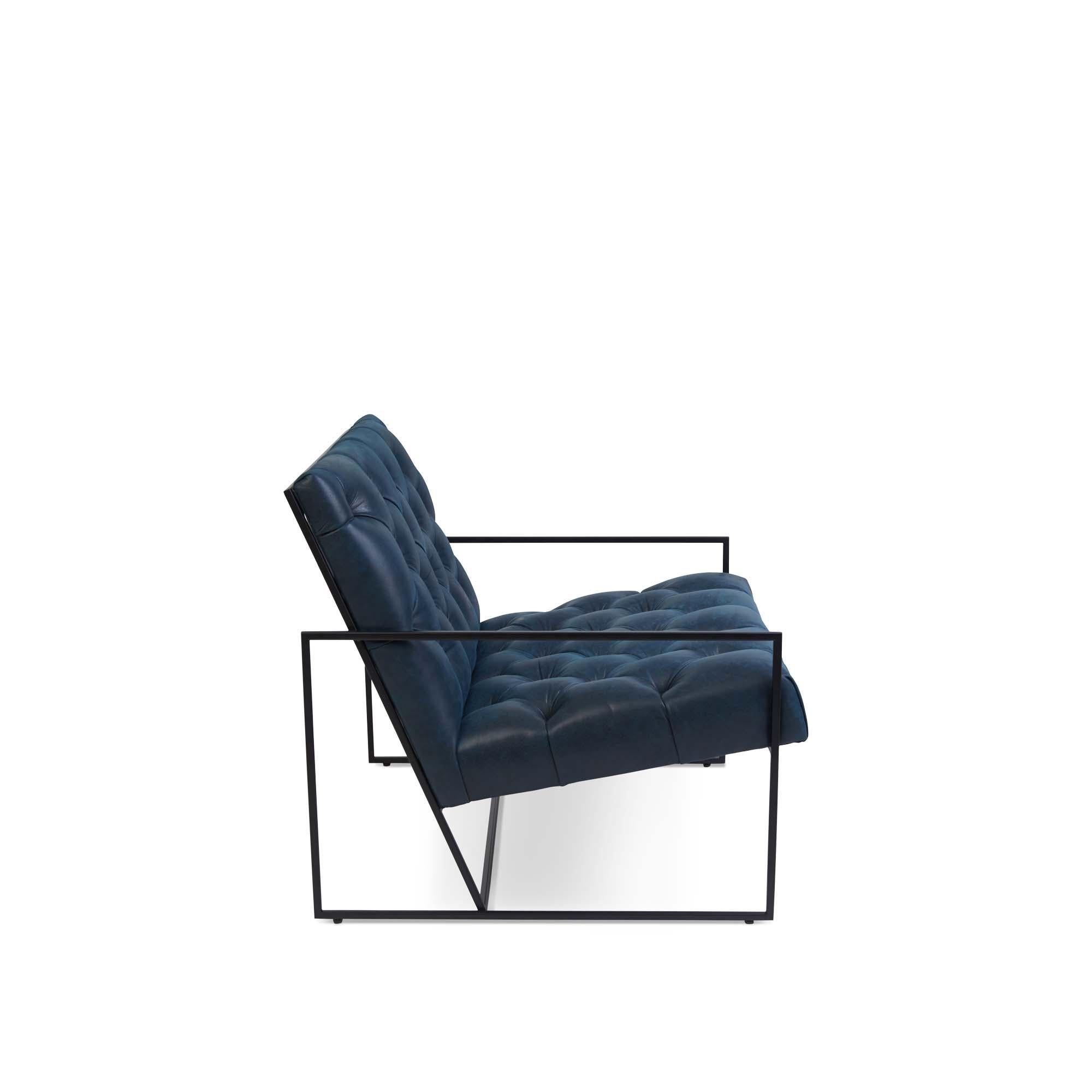 The Thin frame lounge chair is a modern lounge chair with a low-profile, thin metal frame that is available in an array of finishes and the option of diamond tufting. 

The Lawson-Fenning Collection is designed and handmade in Los Angeles,