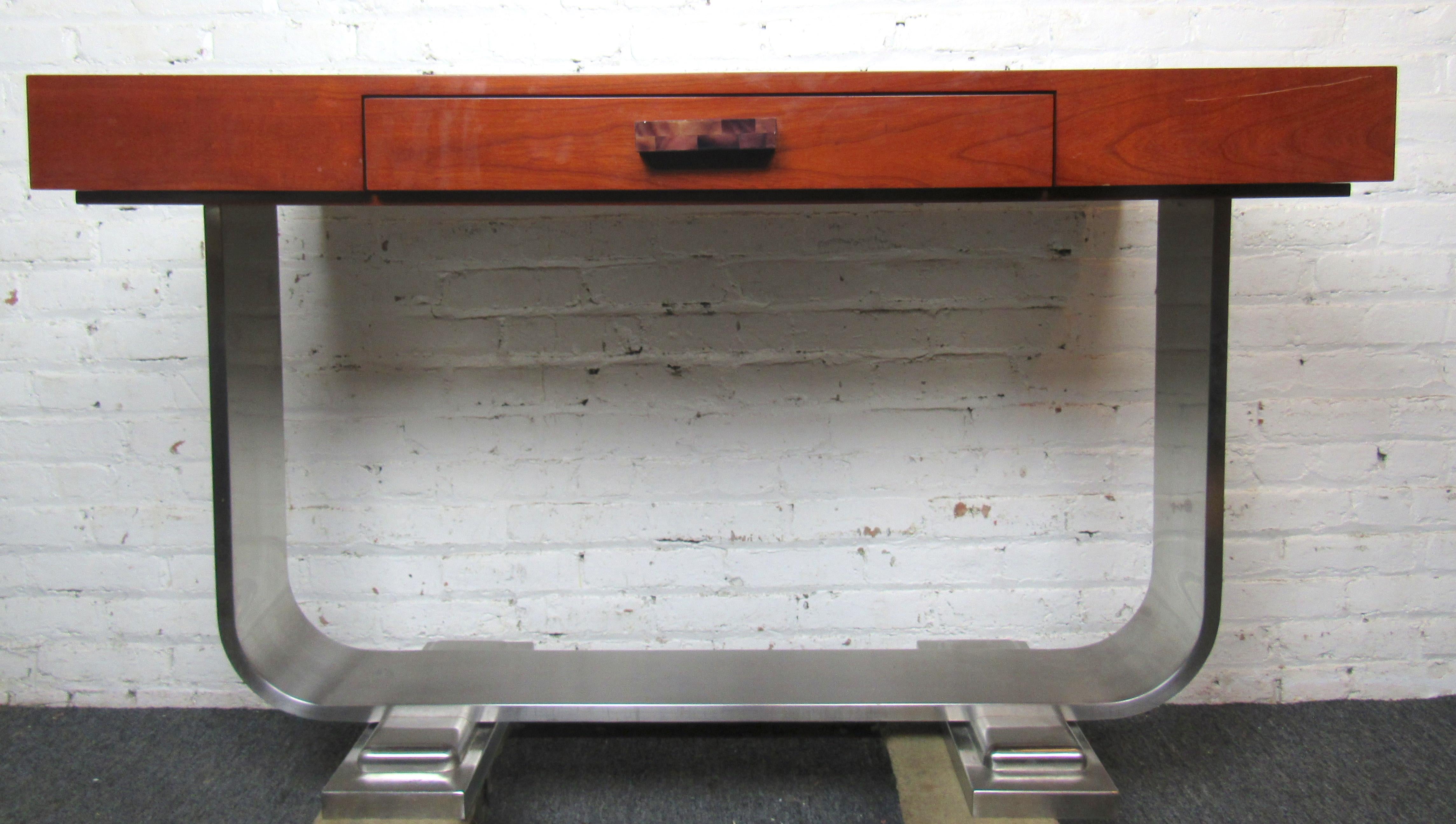Leather top desk with chrome base. Single drawer with acrylic pull and finished back.
Location: Brooklyn NY.