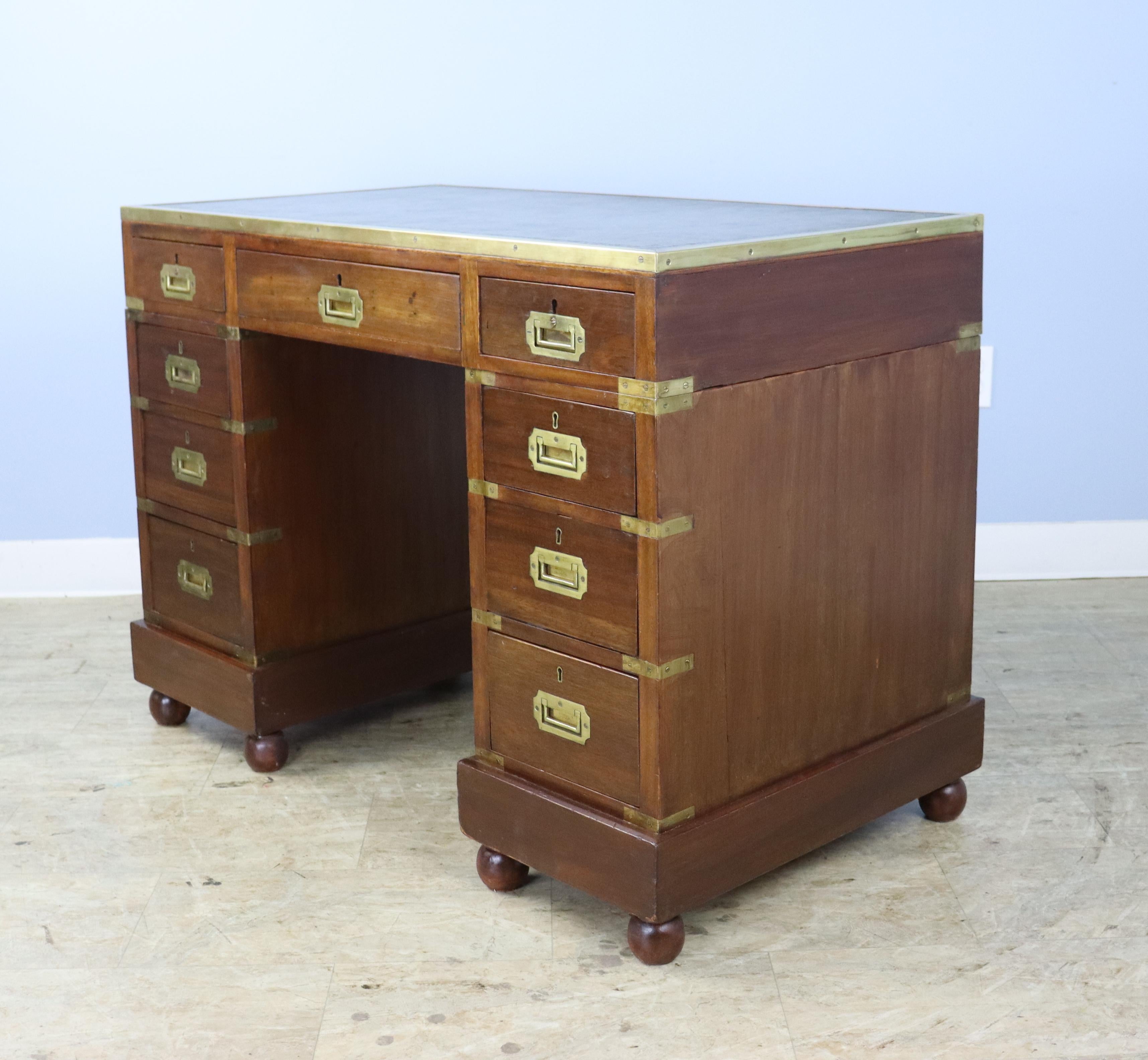 Leather Topped Mahogany Campaign Desk with Brass Moulded Edge In Good Condition For Sale In Port Chester, NY
