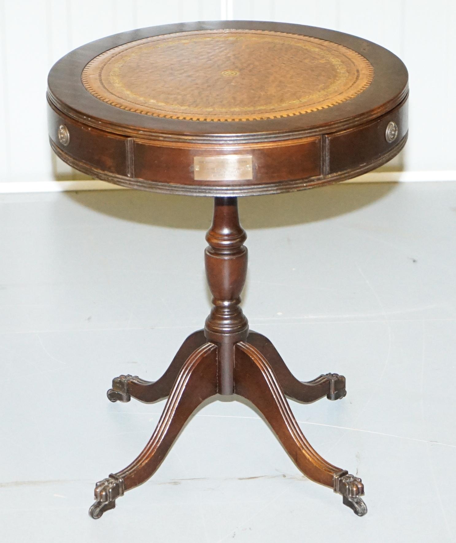 We are delighted to offer for sale this lovely Regency style mahogany drum table with leather top three drawers and a bronze plaque 

A good looking piece, the leather top has nicely aged, it has gold leaf embossing, there is a bronze plaque which
