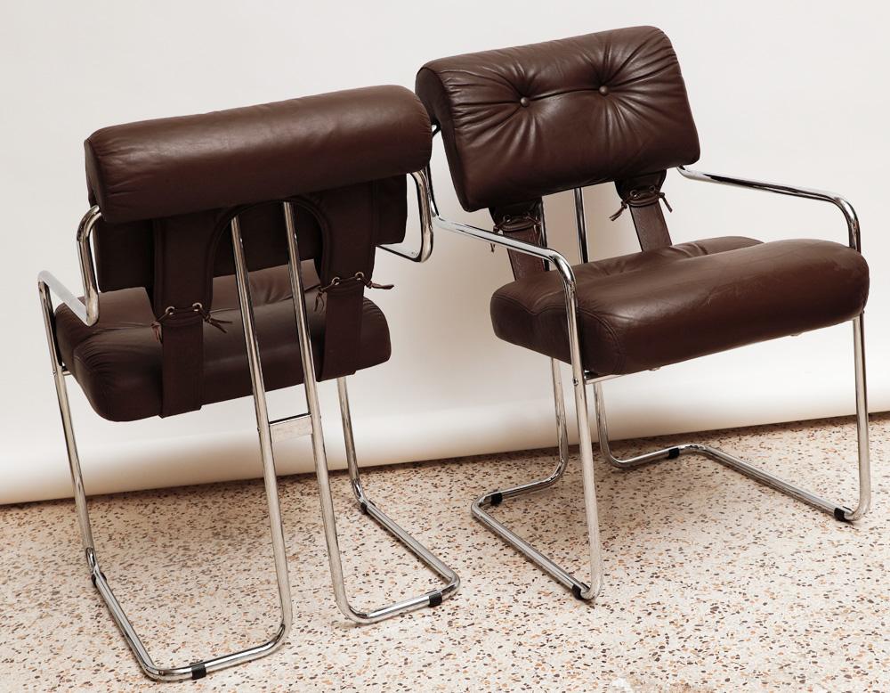 Original vintage pair of chrome framed Tucroma chairs with deep brown soft leather cushions, designed by Guido Faleschini in 1975 for the Pace Collection. Showing very minimal signs of wear, these are a perfect addition to your collection whether as