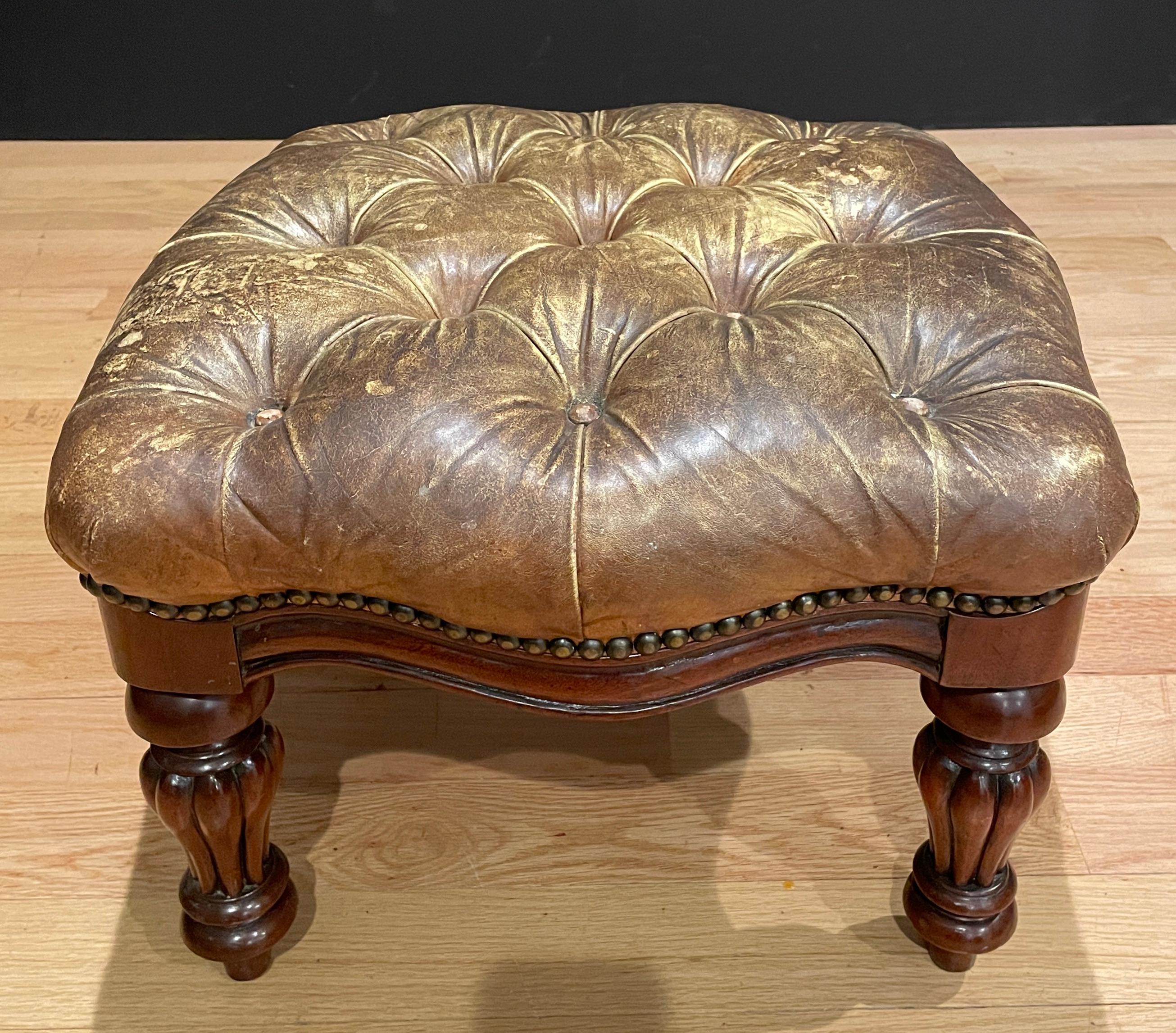 Leather tufted mahogany footstool/ottoman with turned legs olive green/beige weathered leather.
