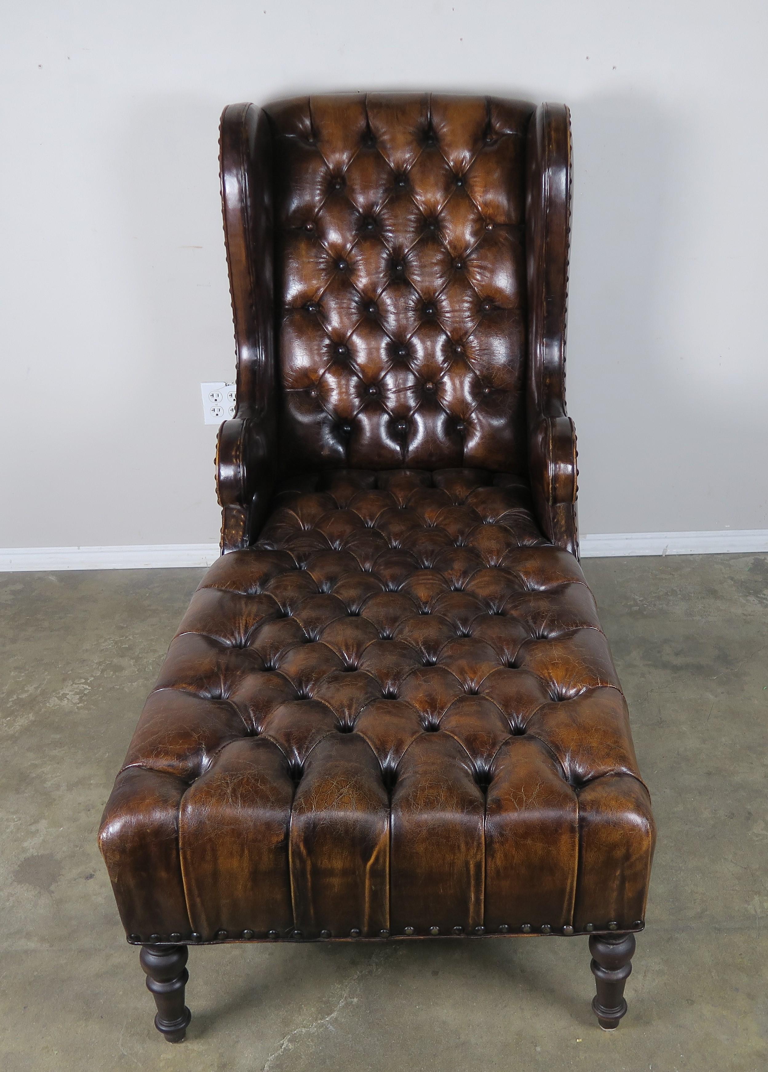 Leather Tufted Wingback Chaise with Nailhead Trim Detail In Distressed Condition In Los Angeles, CA