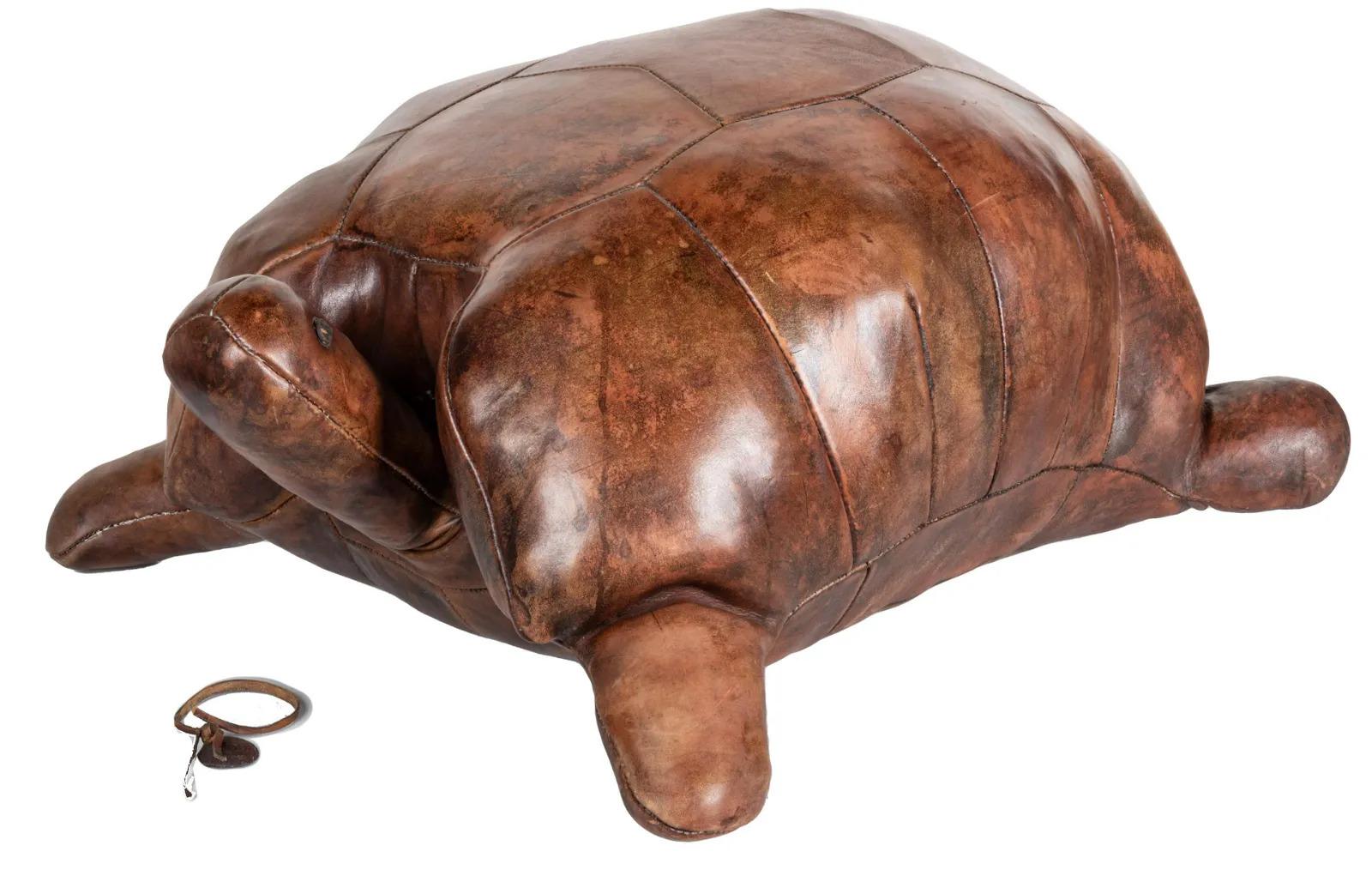 Leather Turtle Footstool or Ottoman,
Dimitri Omersa,
1970s

The large realistic leather model of a turtle, designed as a footstool or ottoman by Dimitri Omersa with leather tag.

Dimensions: 12 inches high x 22 inches deep x 28