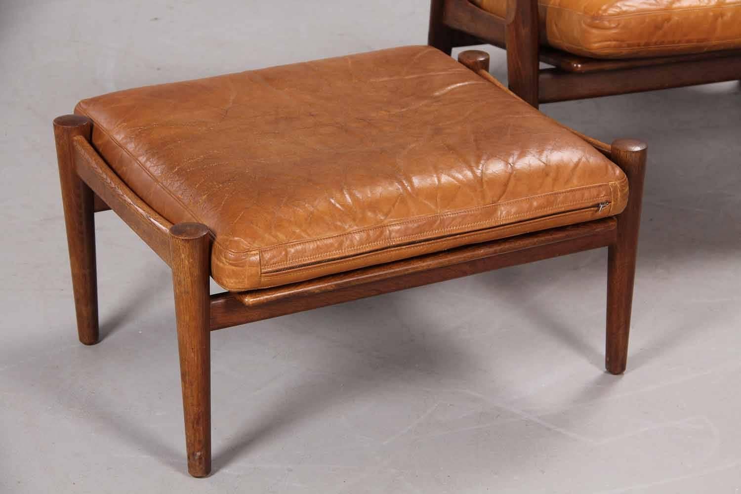 Danish Leather Upholstered Armchair and Ottoman by Hans Wegner