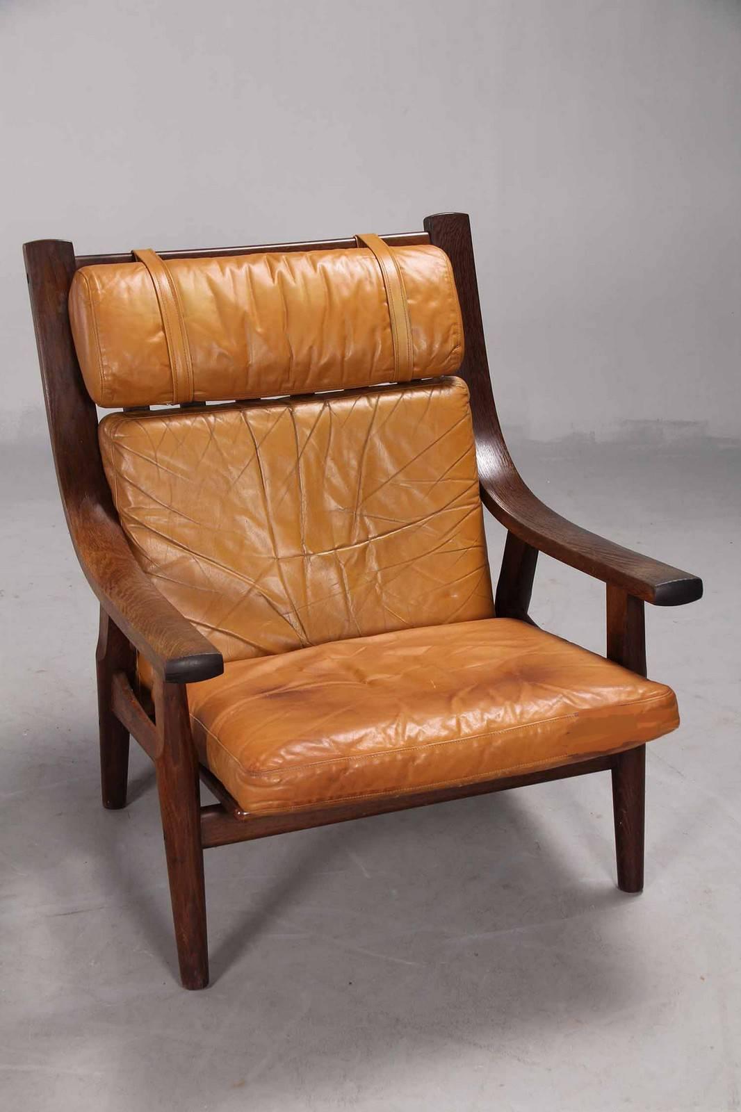 Leather Upholstered Armchair and Ottoman by Hans Wegner In Good Condition In Hudson, NY