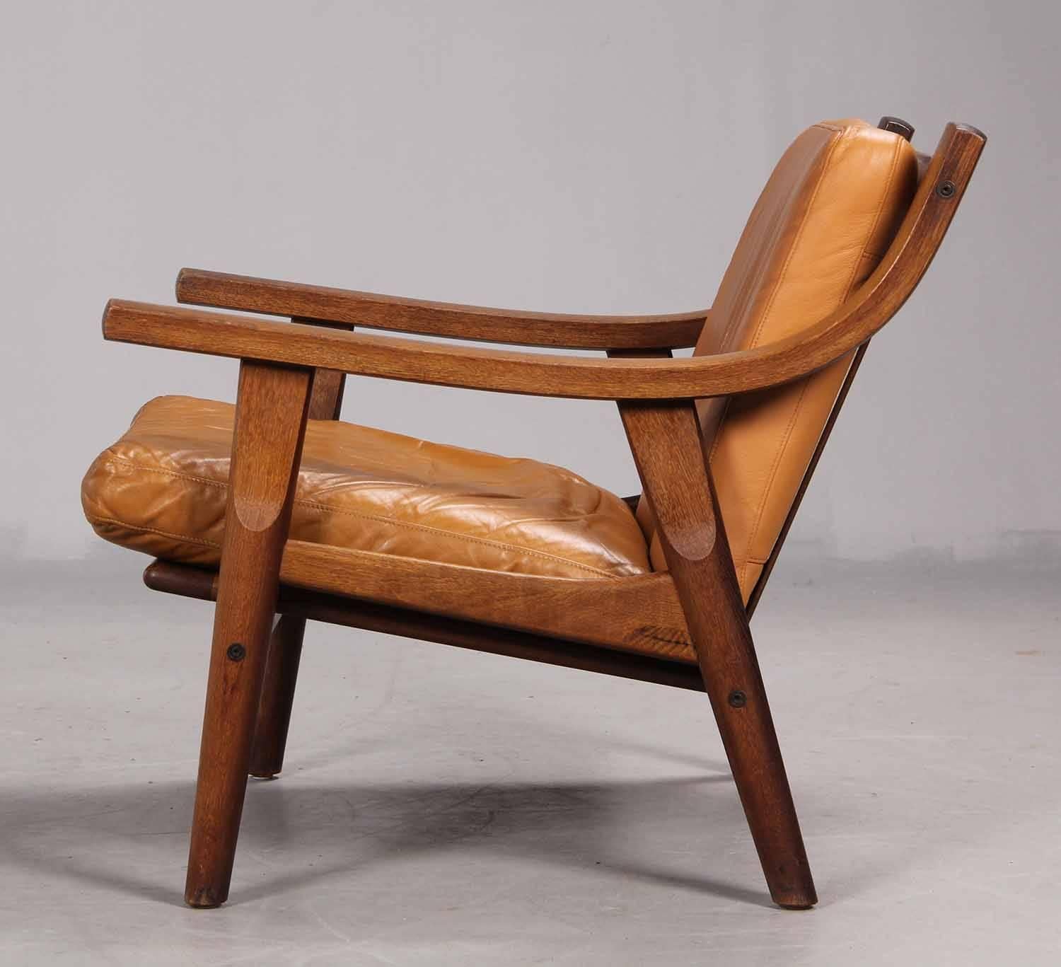 Scandinavian Modern Leather Upholstered Armchair by Hans Wegner