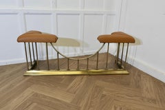 Leather Upholstered Brass Club Fender  This is a stylish piece