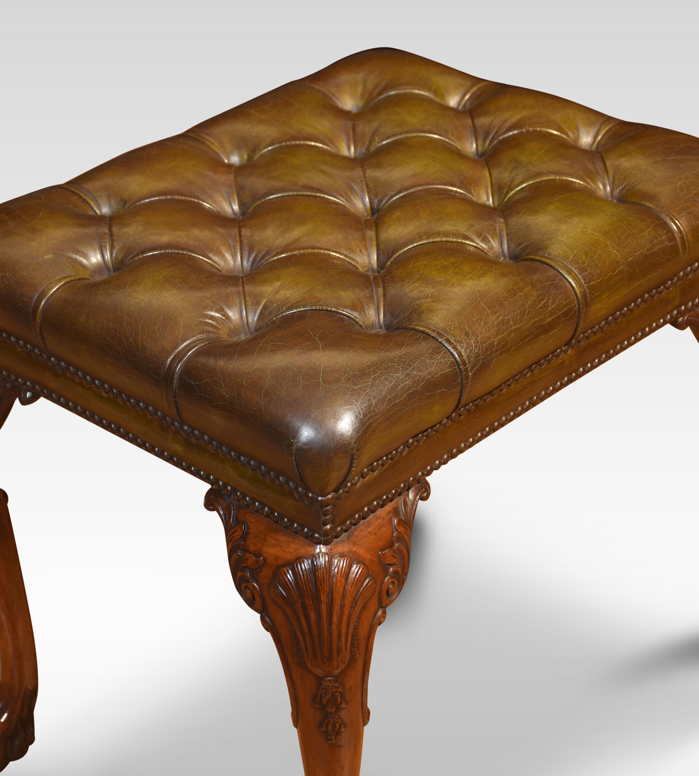Carved stool, the rectangular upholstered leather deep buttoned seat raised up on four carved cabriole legs terminating in paw feet. The leather has been replaced and hand-dyed.
Dimensions
Height 23 Inches
Width 25 Inches
Depth 20 Inches