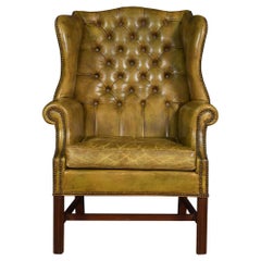 Antique Leather Upholstered Wingback Armchair