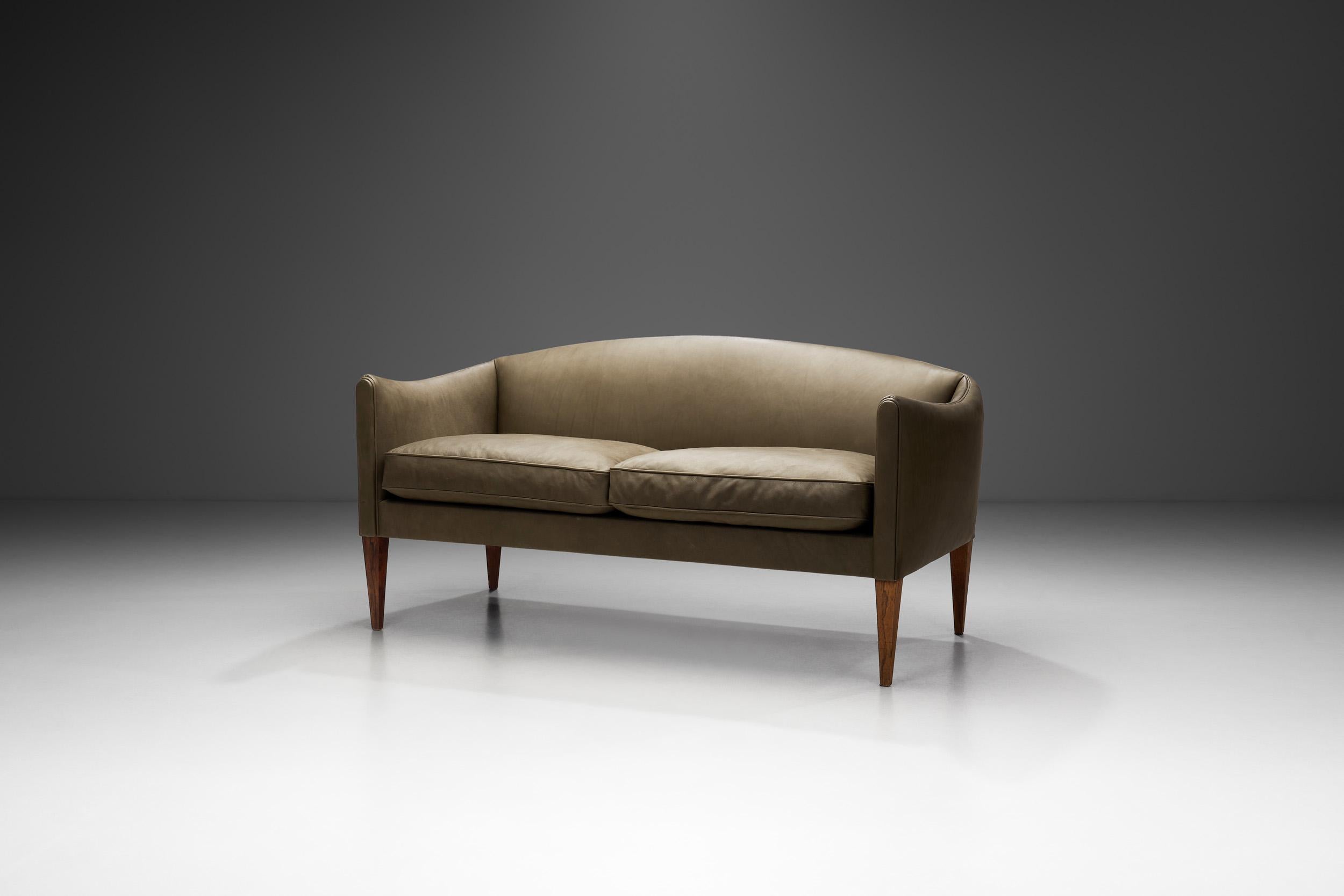 Danish furniture designer Illum Wikkelsø believed that furniture should be built to last, to indulge the body and to please the eye. He belonged to a group of designers who represented the Golden Age of Danish design during the 1950s and 1960s. With