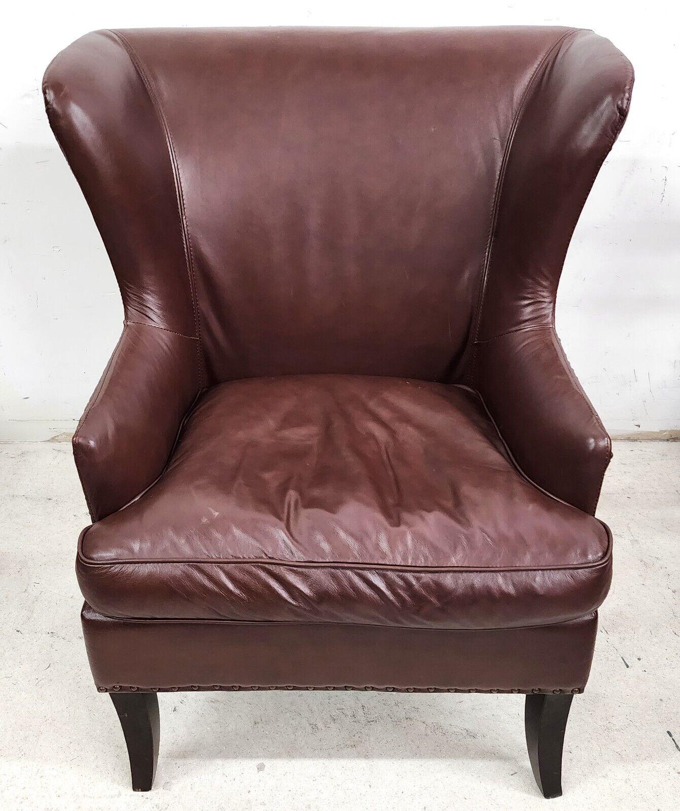 Offering one of our recent palm beach estate fine furniture acquisitions of an
Oversized real leather Wingback library reading armchair by DeCoro
Beautiful chair! Very comfortable.

Approximate measurements in inches
40.5