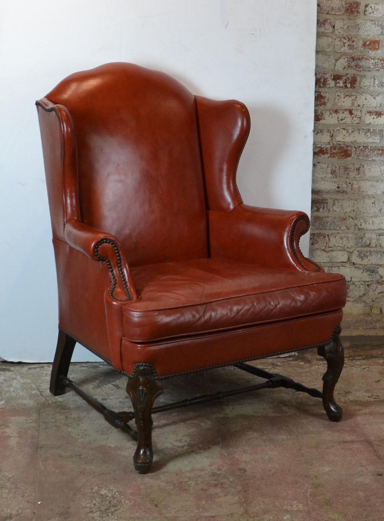 Queen Ann style leather wingback chair. Wonderful quality leather and color. Measure: Arm 25