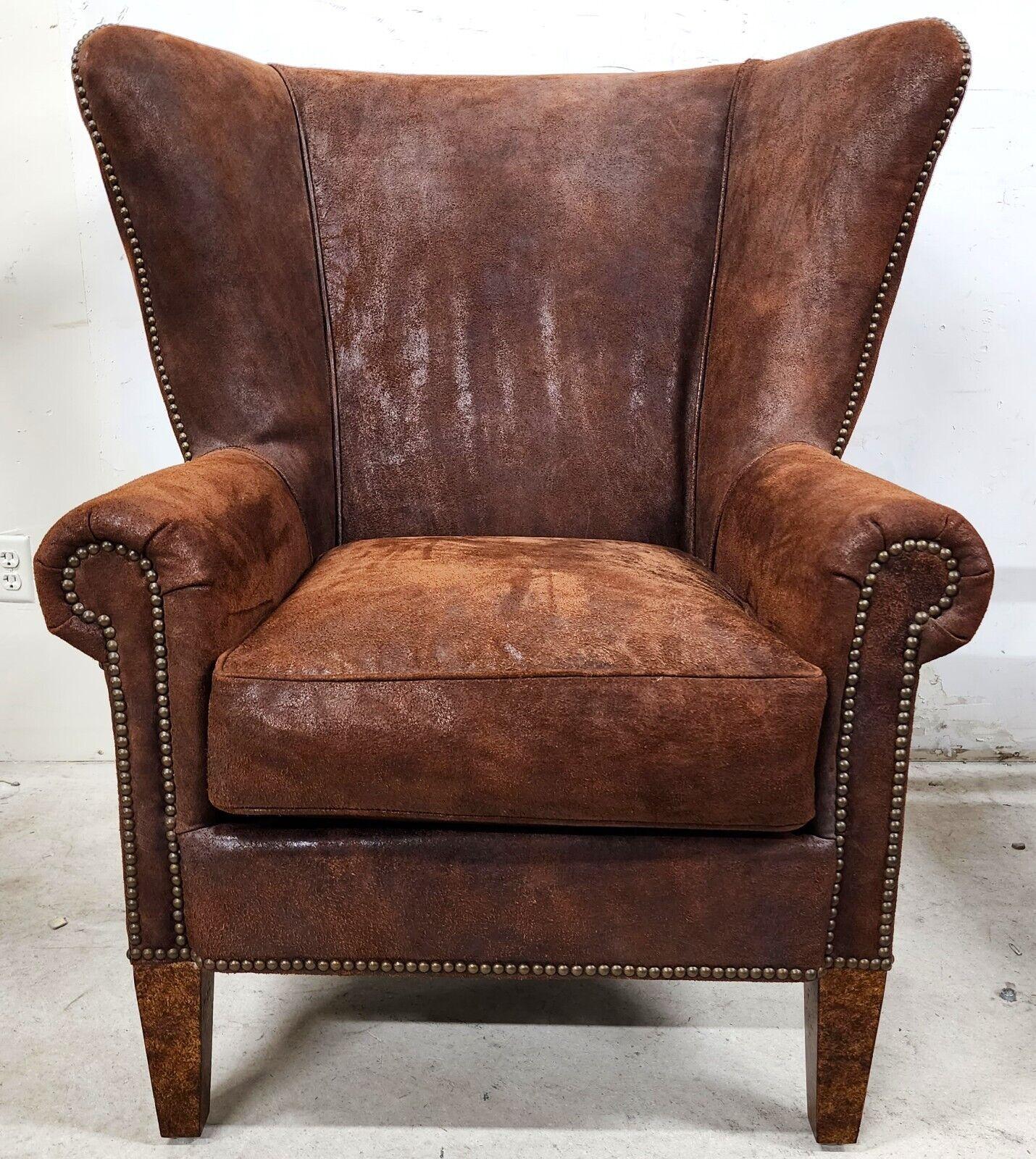 Rustic Leather Wingback Lounge Chair by PAUL ROBERT For Sale