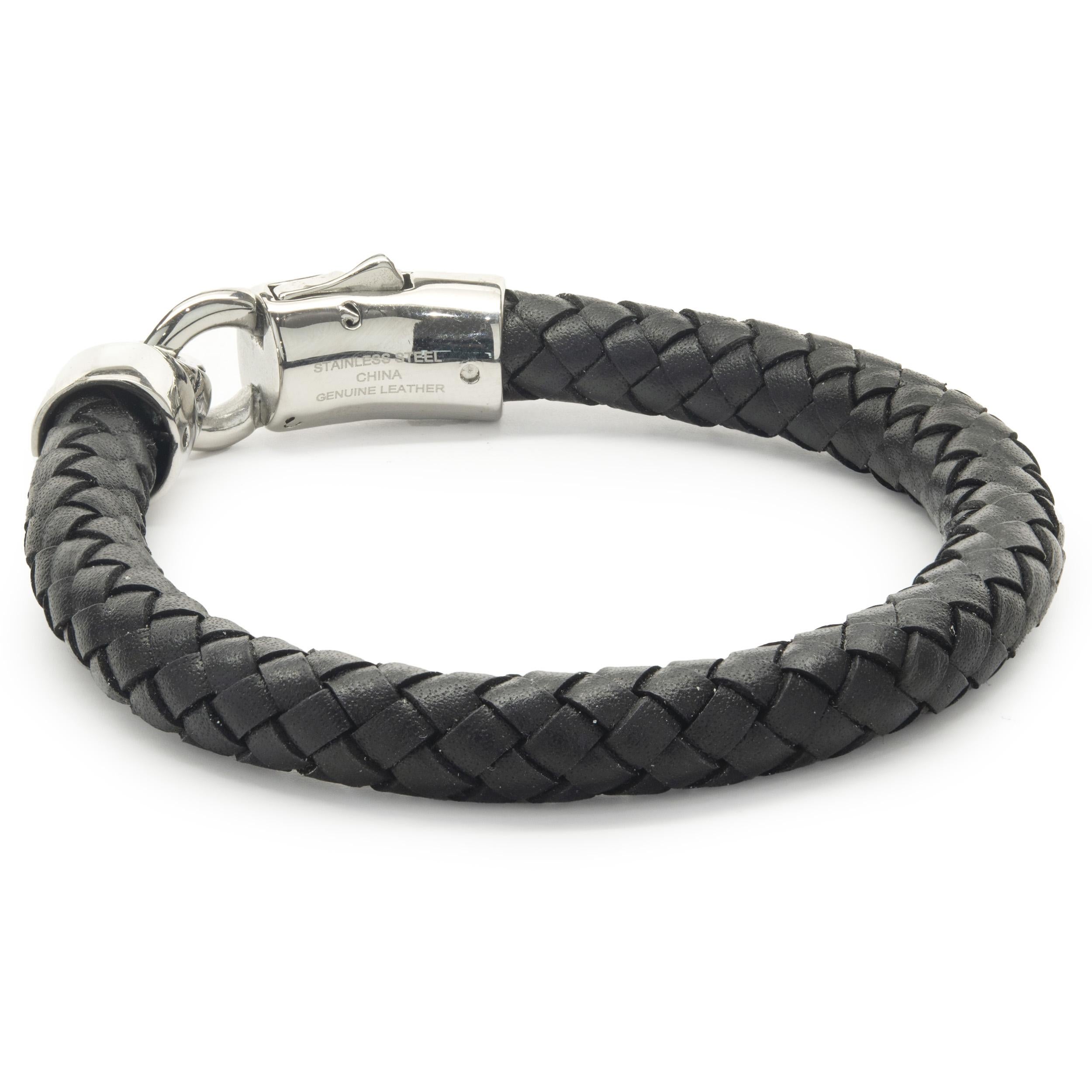 Designer: custom 
Material: leather, stainless
Dimensions: bracelet will fit up to a 6.5-inch wrist
Weight: 22.19 grams
